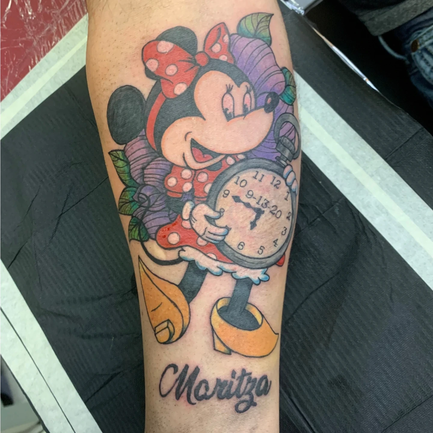 Minnie mouse American traditional tattoo on the forearm by Chaz Escobar
