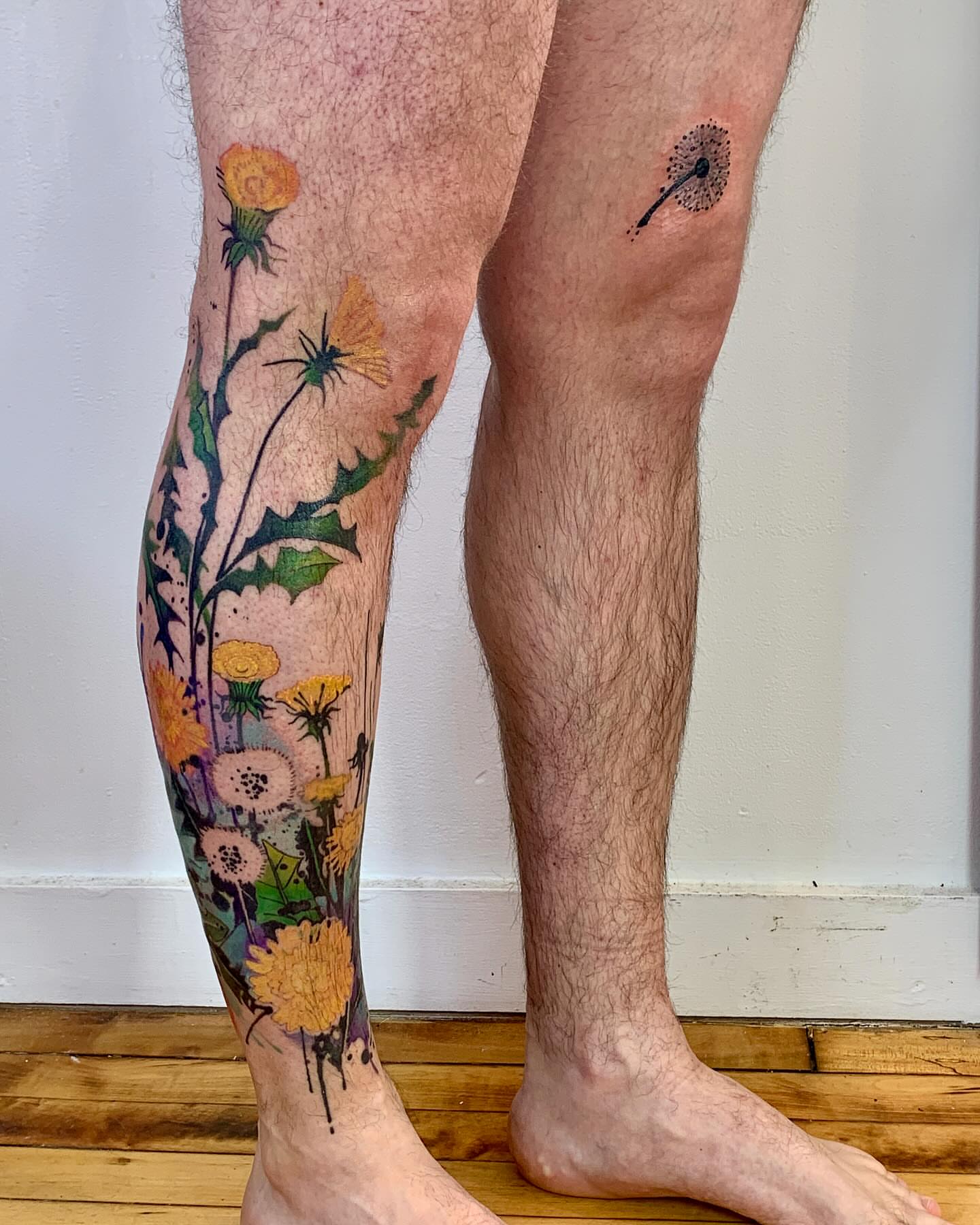 Floral bouquet dotwork tattoo on the calf by Gene Coffey, New York, New York