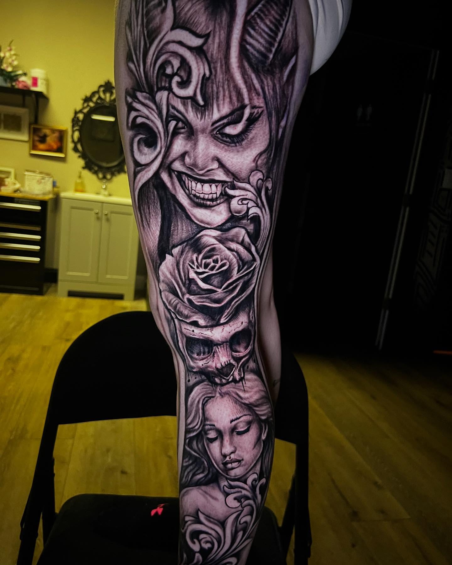Tattoo by @burkes.body.graphic — black_and_grey, realism