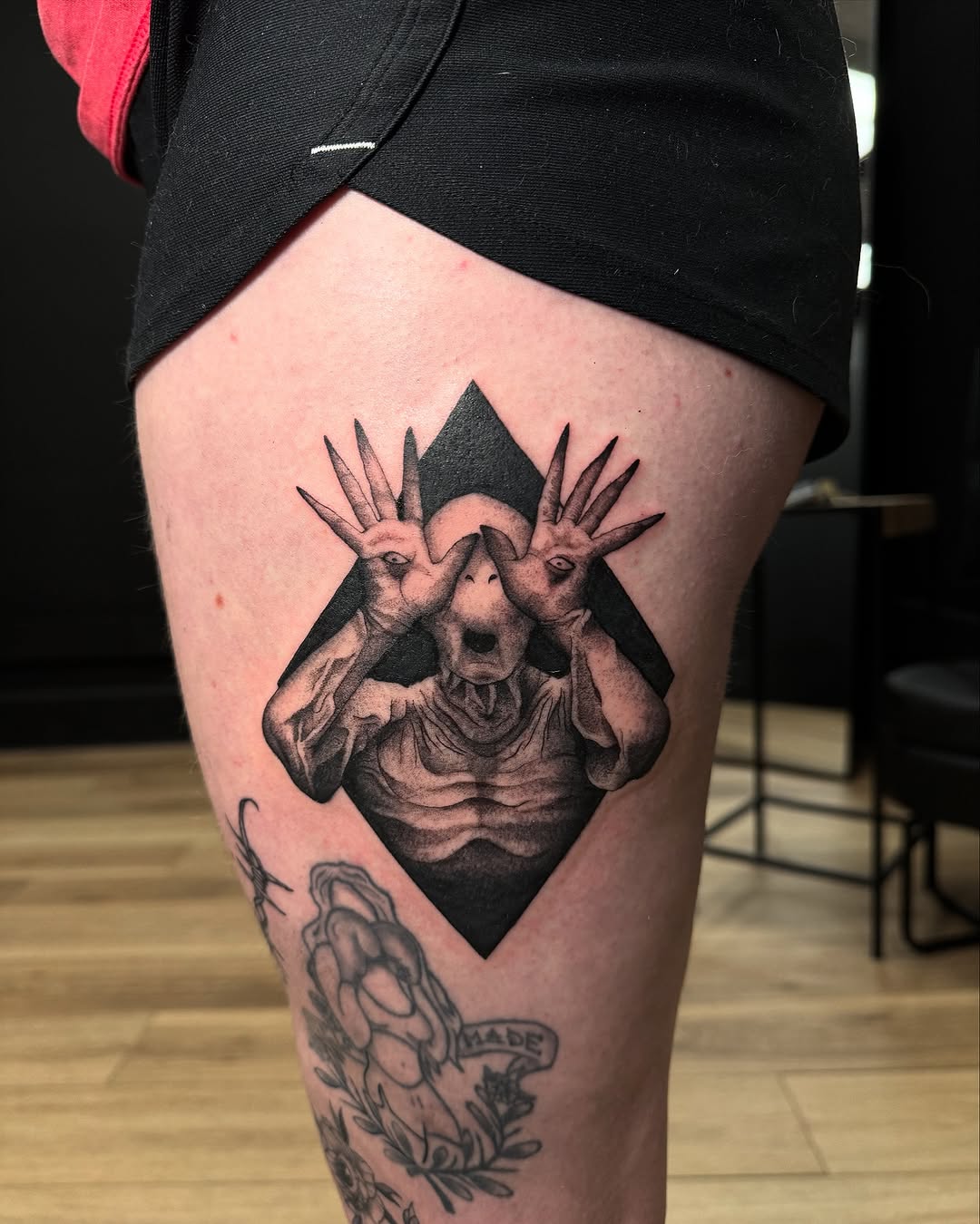 Pale Man from Pan's Labyrinth dark art tattoo on the thigh by Dre