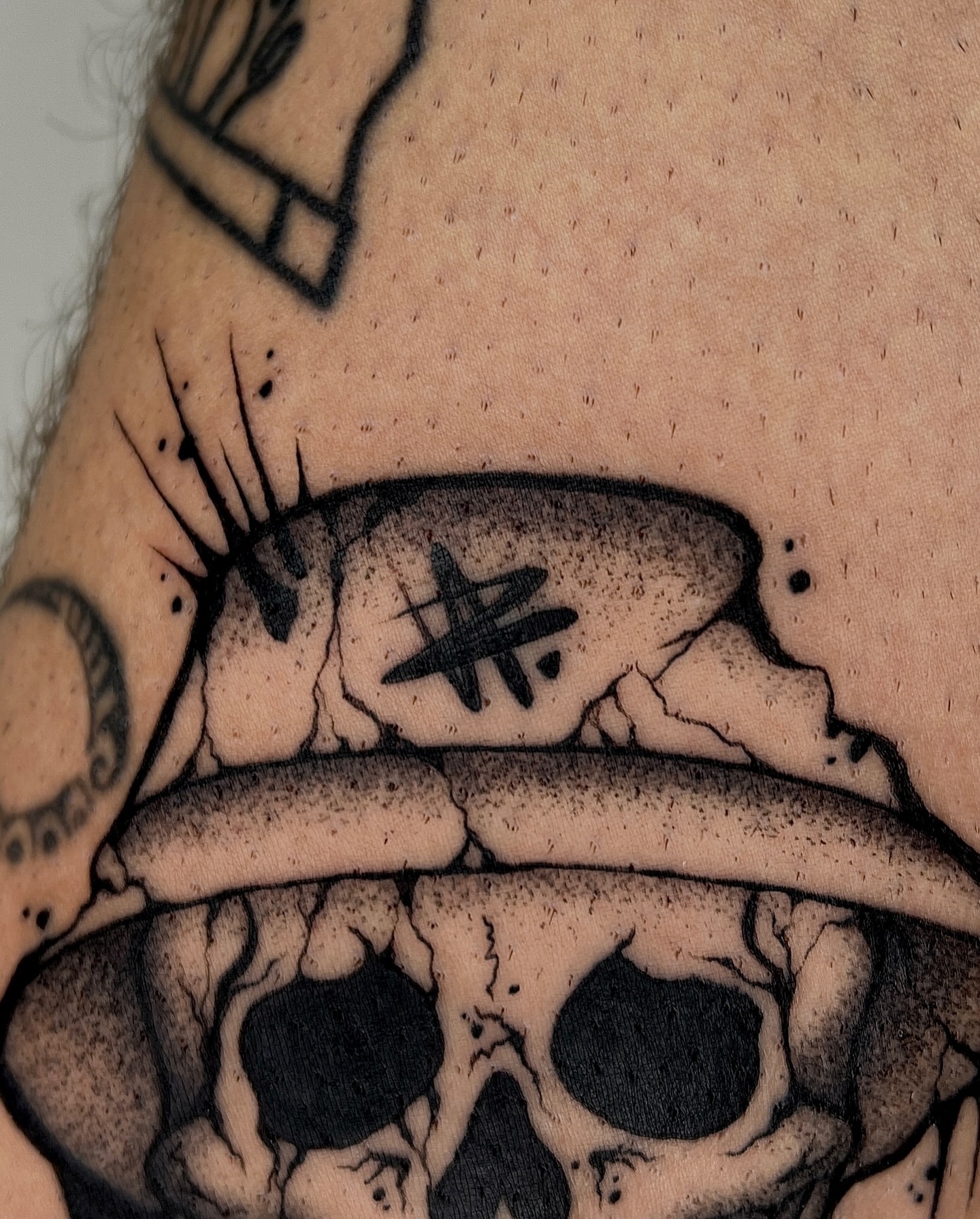 Skull black and grey tattoo on the forearm by Rebel milly Tattoo