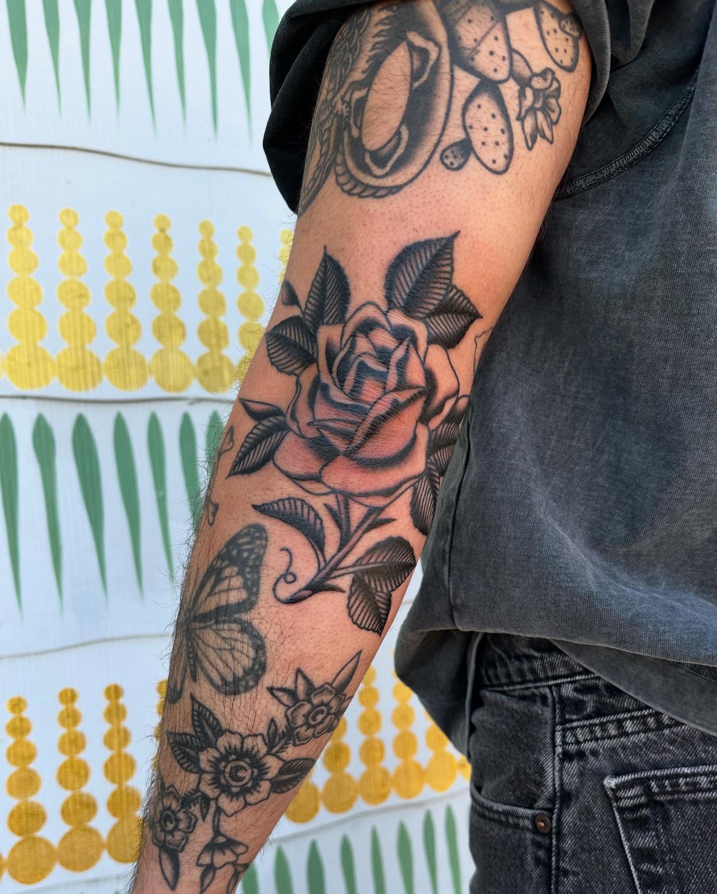 Rose American traditional tattoo on the forearm by Jess Ritchie, Austin, Texas