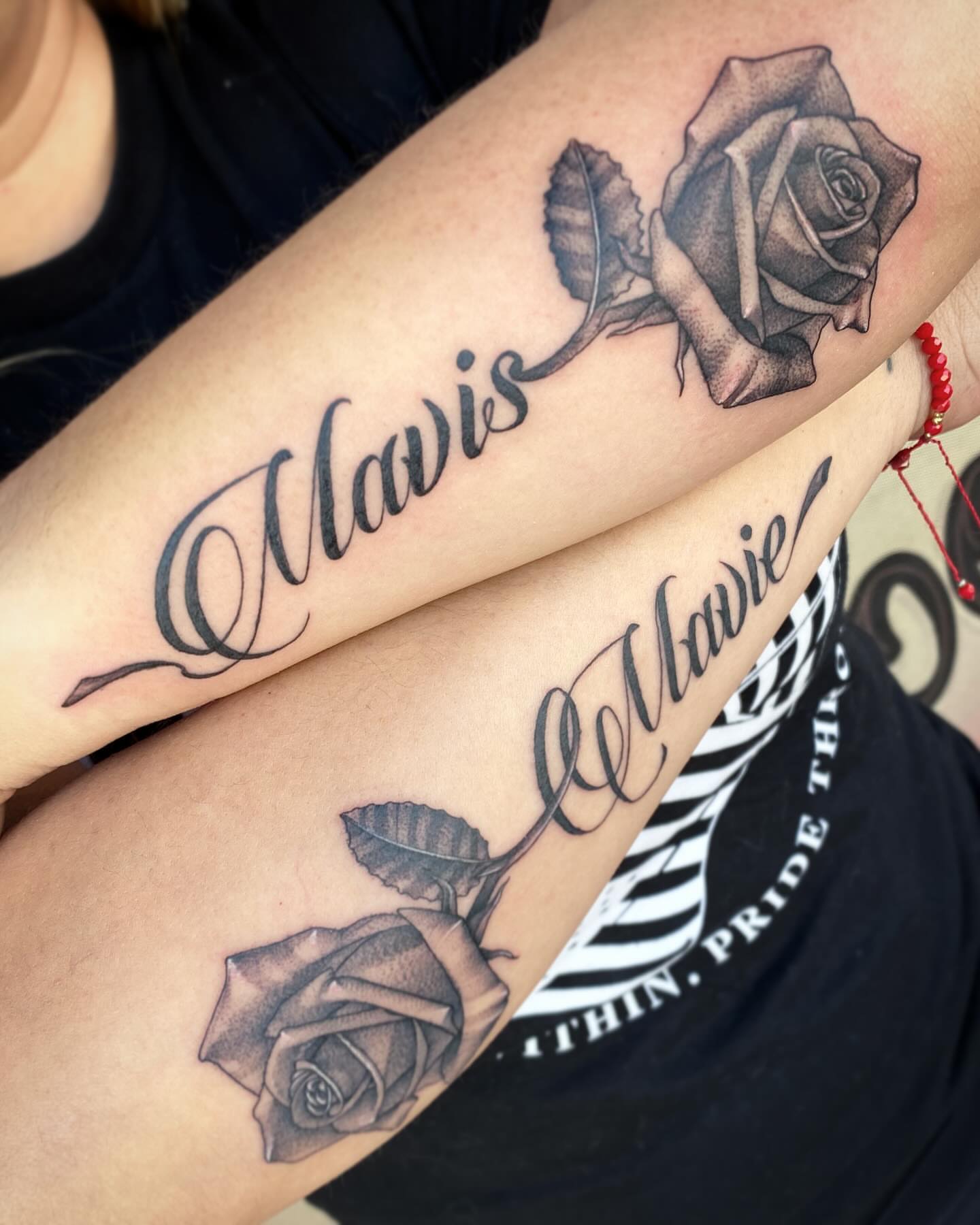 Rose and name black and grey tattoo on the forearm by Seth Mullin, Hemet, California