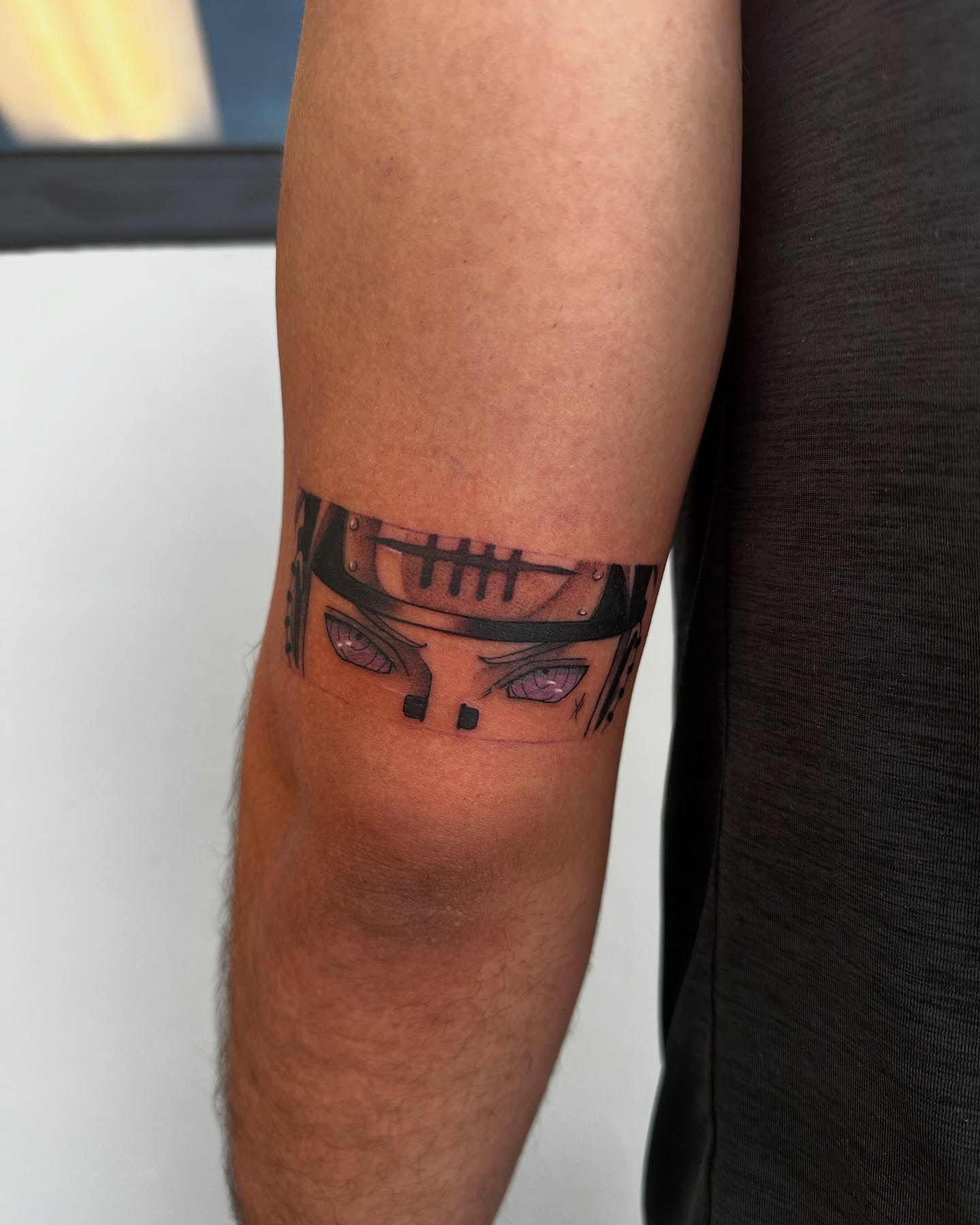 Anime character anime tattoo on the forearm by Alfred