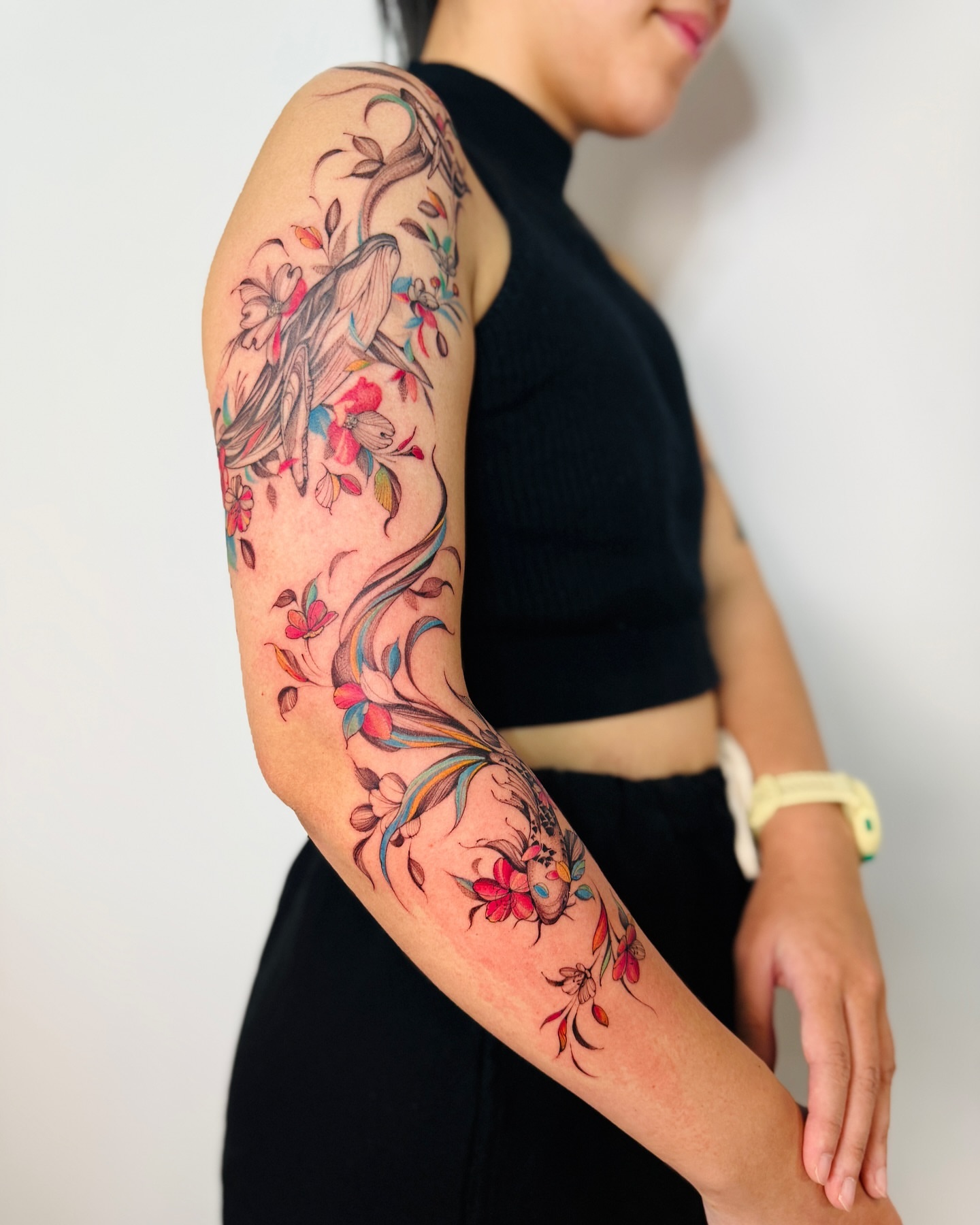 Floral vine new school tattoo on the forearm by Dung Ngo