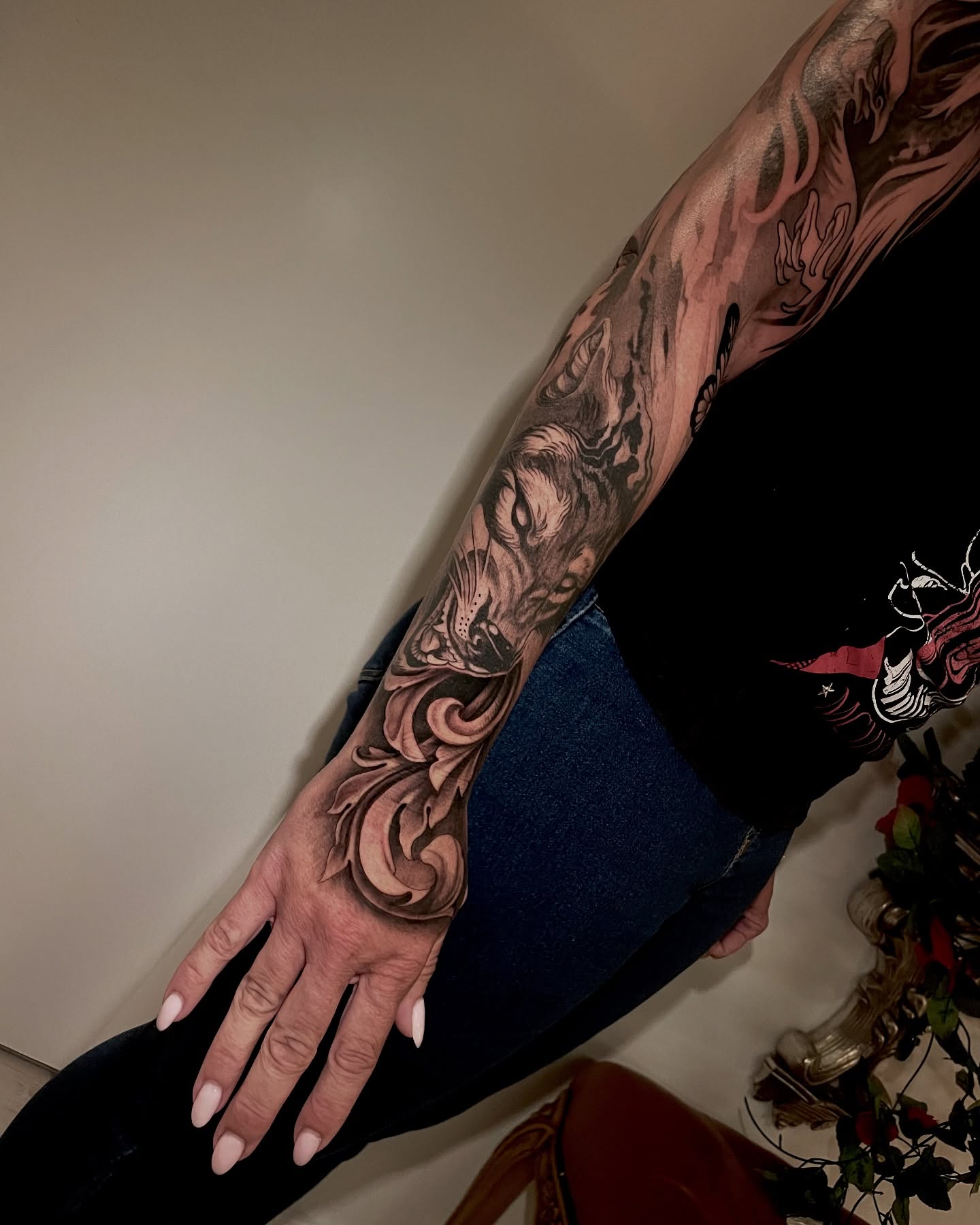 Floral design ornamental tattoo on the forearm by Michelle Carlton