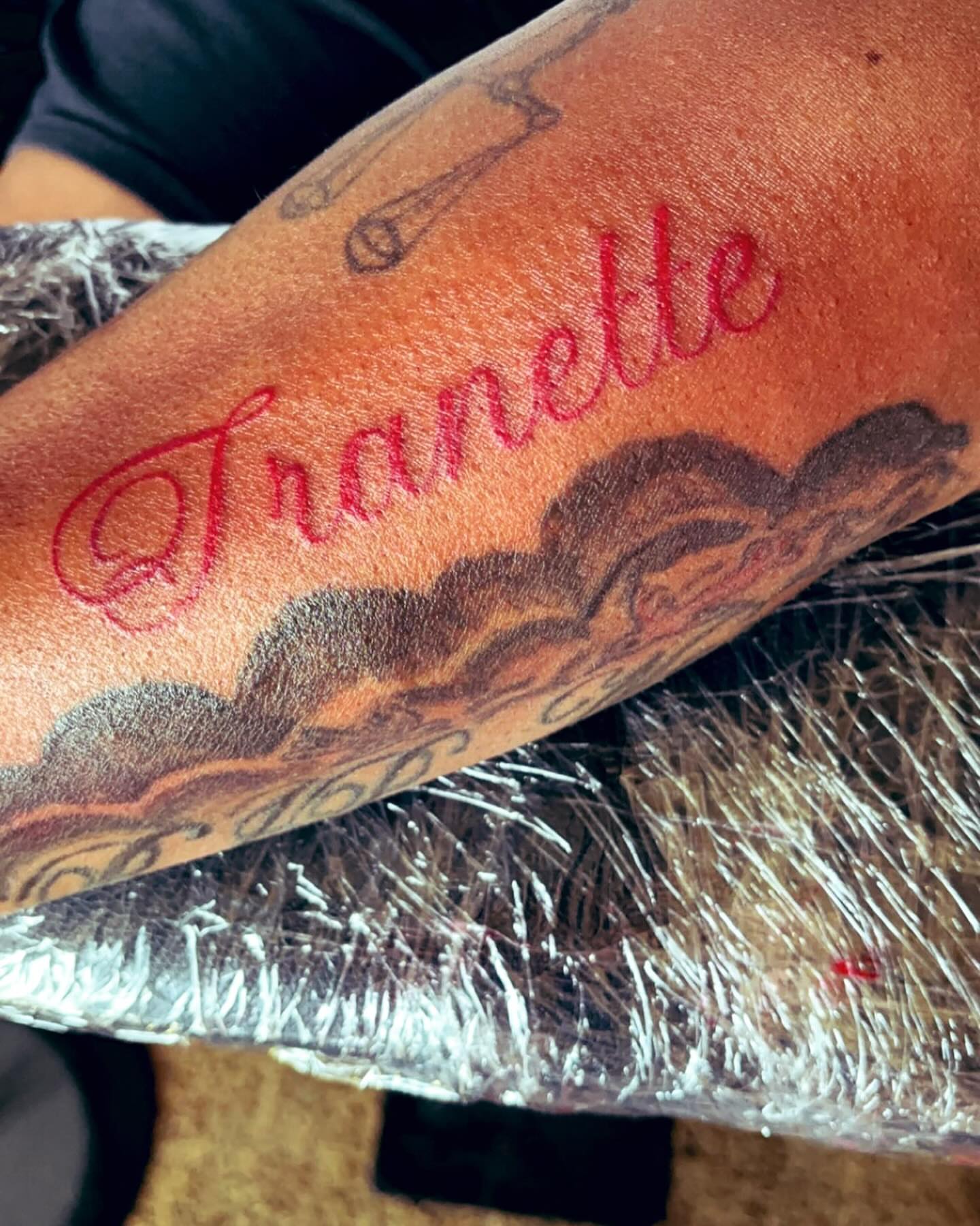Script lettering lettering script tattoo on the forearm by Syneca Wilson, Acton, Massachusetts