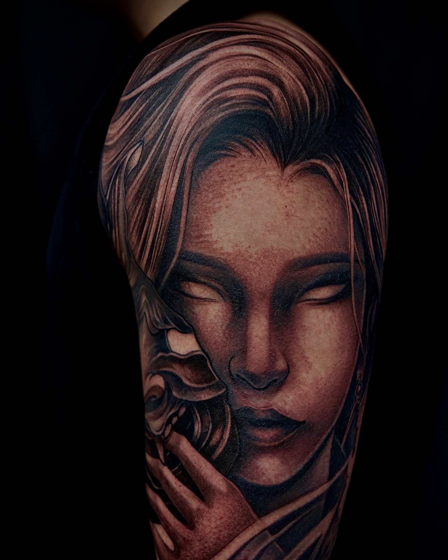 Woman's face realism tattoo on the forearm by Thien Phan