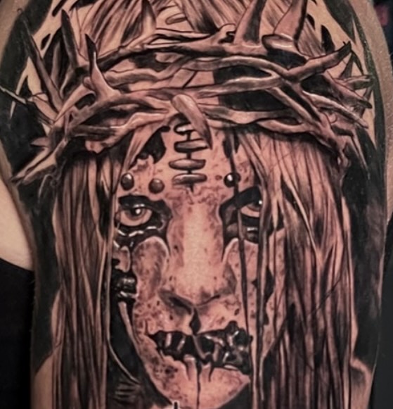 Lion dark realism tattoo on the forearm by Antonio Massimino