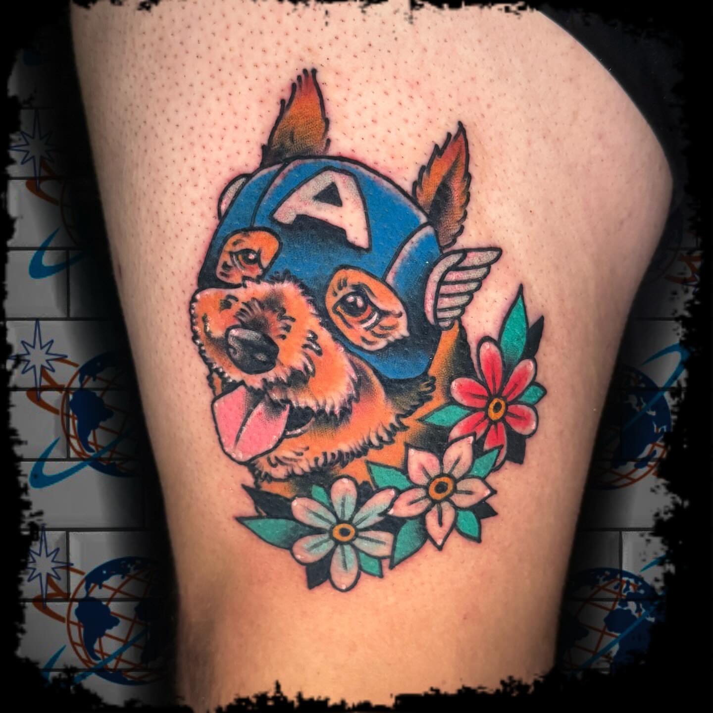 Dog wearing Captain America helmet American traditional tattoo on the thigh by Antonio DeCaro