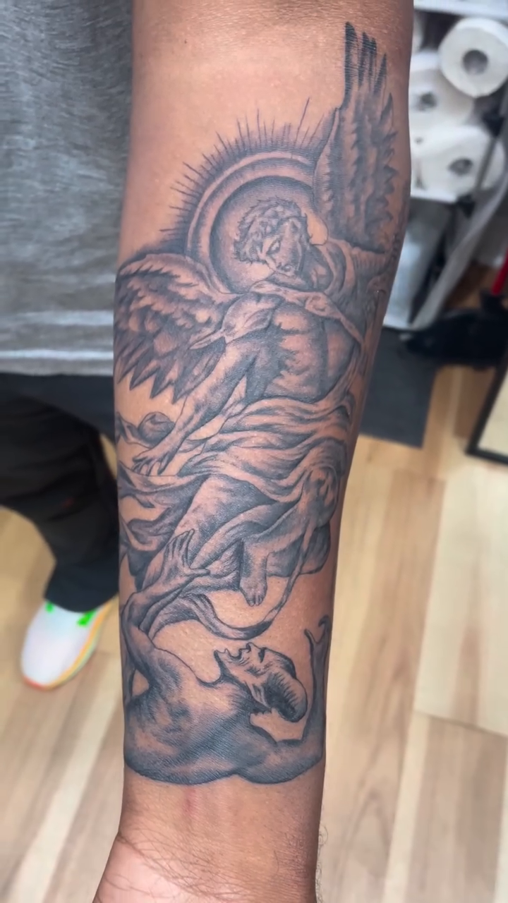 Angel with sun and clouds realism tattoo by Blake