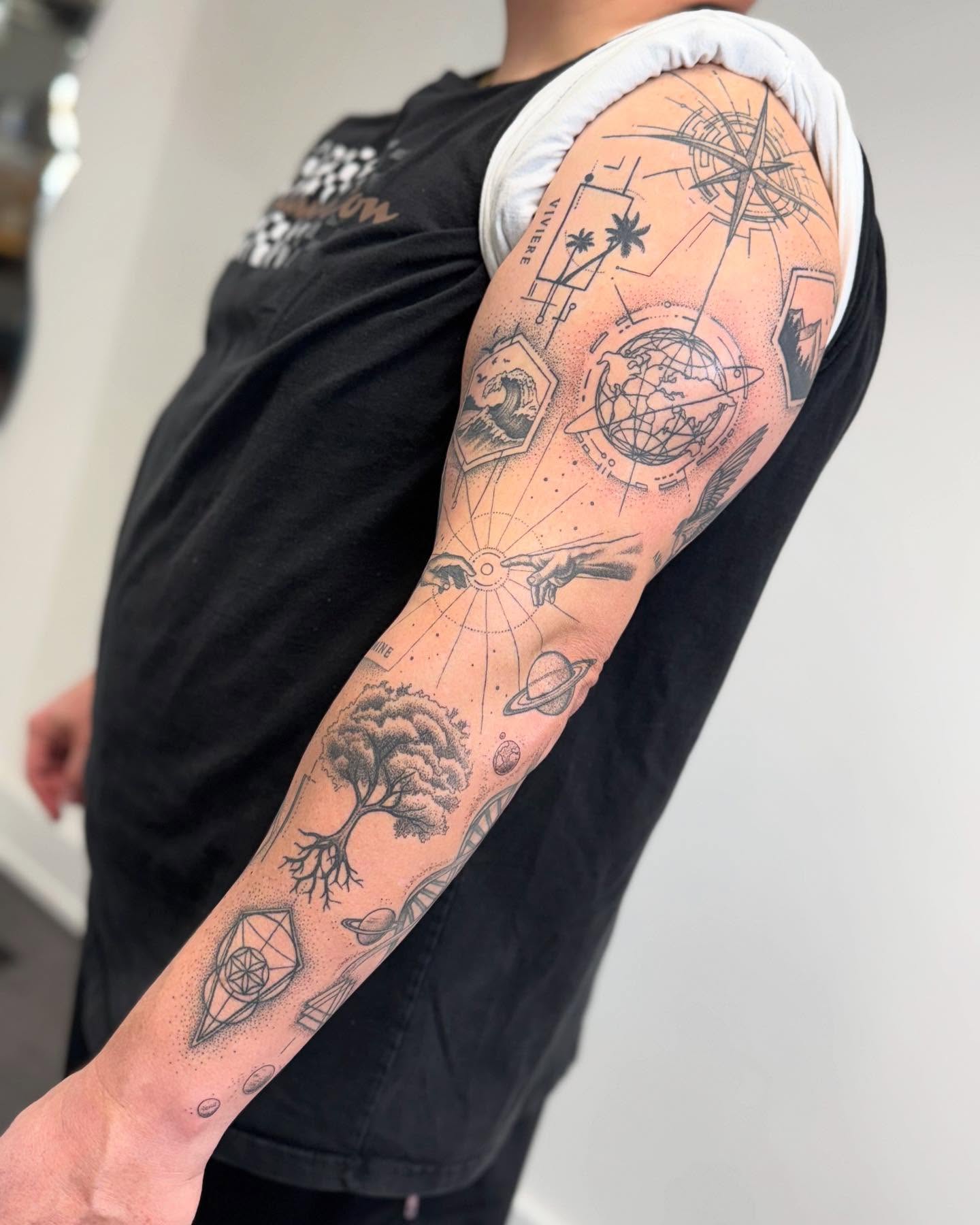 Astronomy and nature dotwork tattoo on the forearm by Erin Blaney