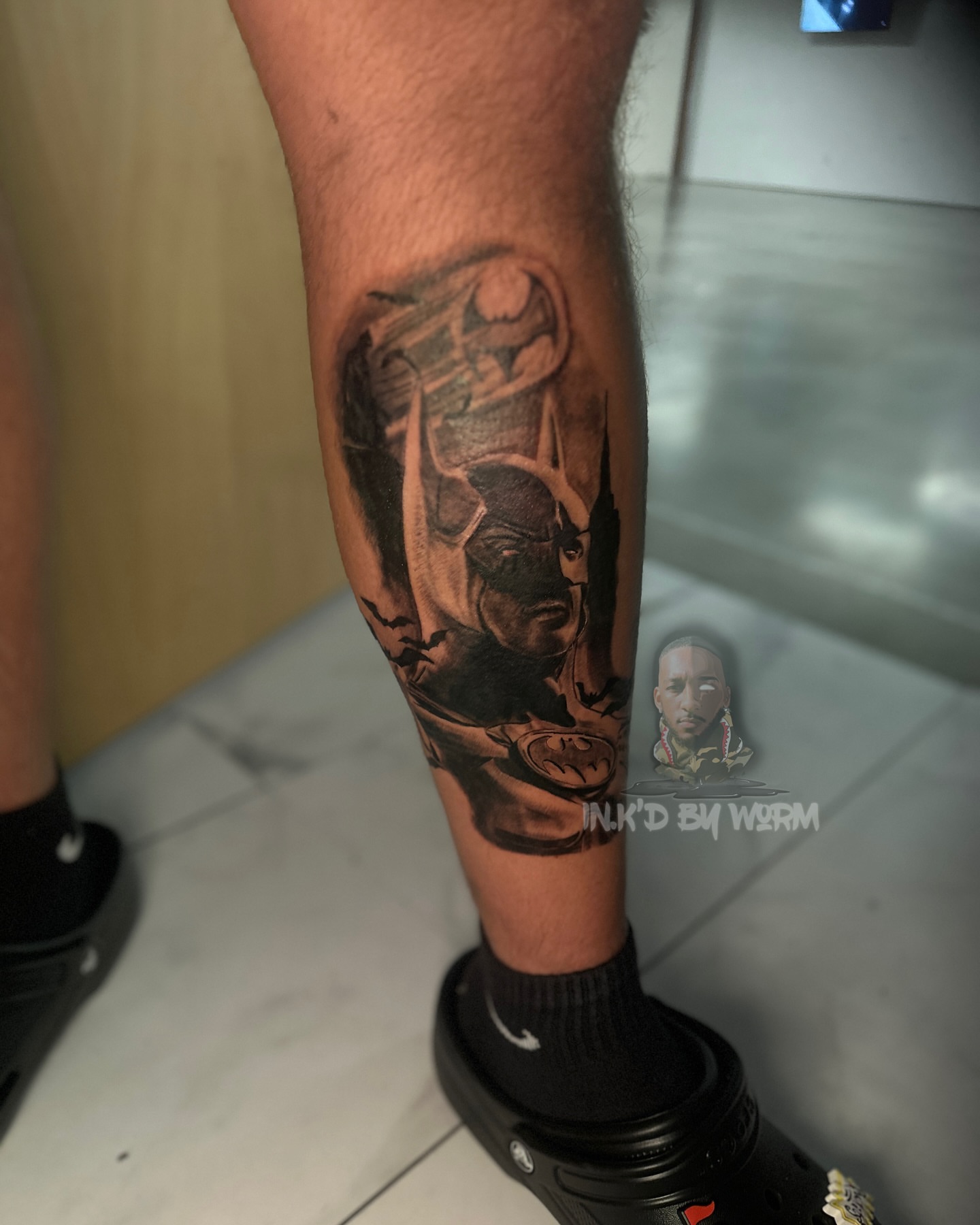 Batman black and grey tattoo on the forearm by ᴡᴏʀᴍ