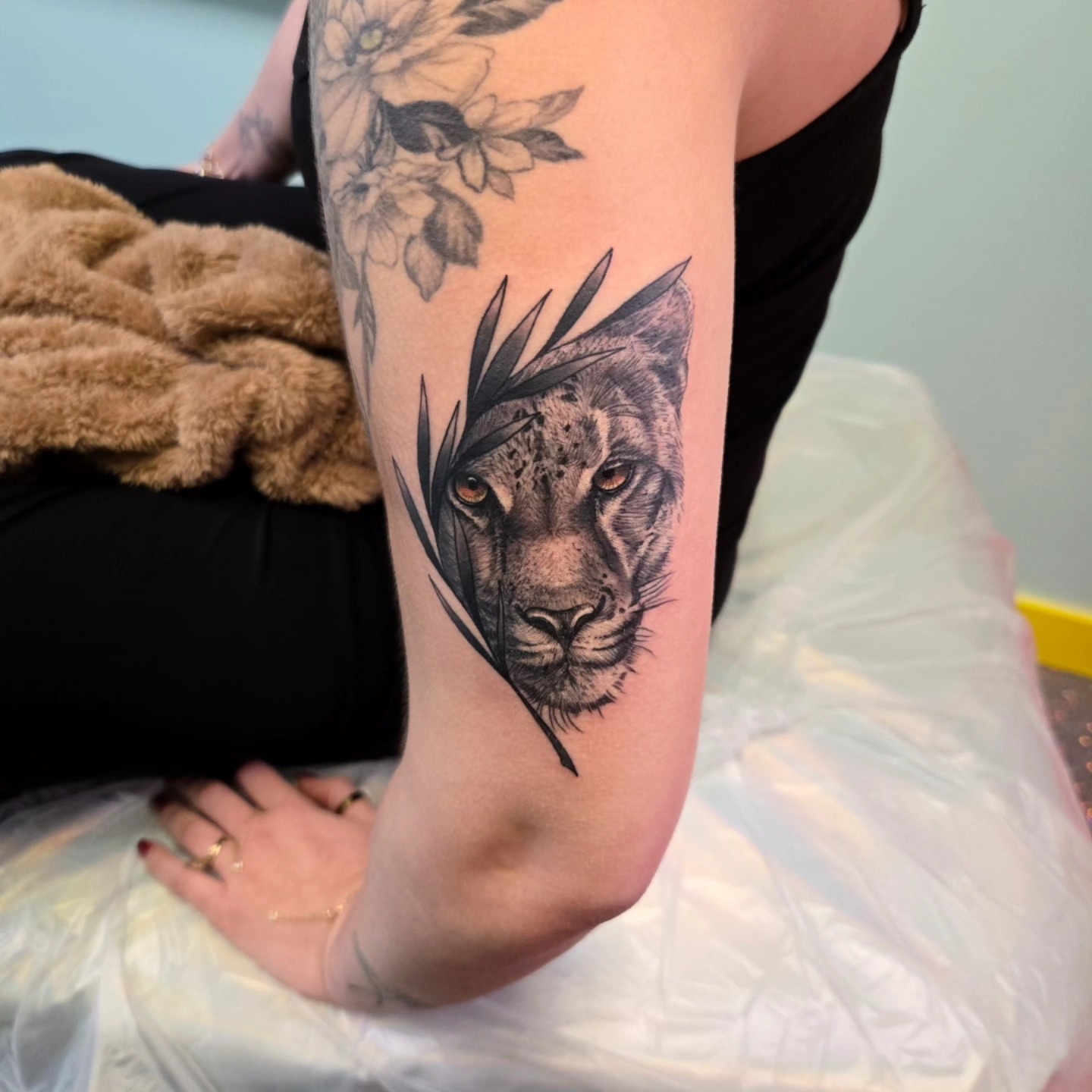 Lion realism tattoo on the forearm by Jake Lee