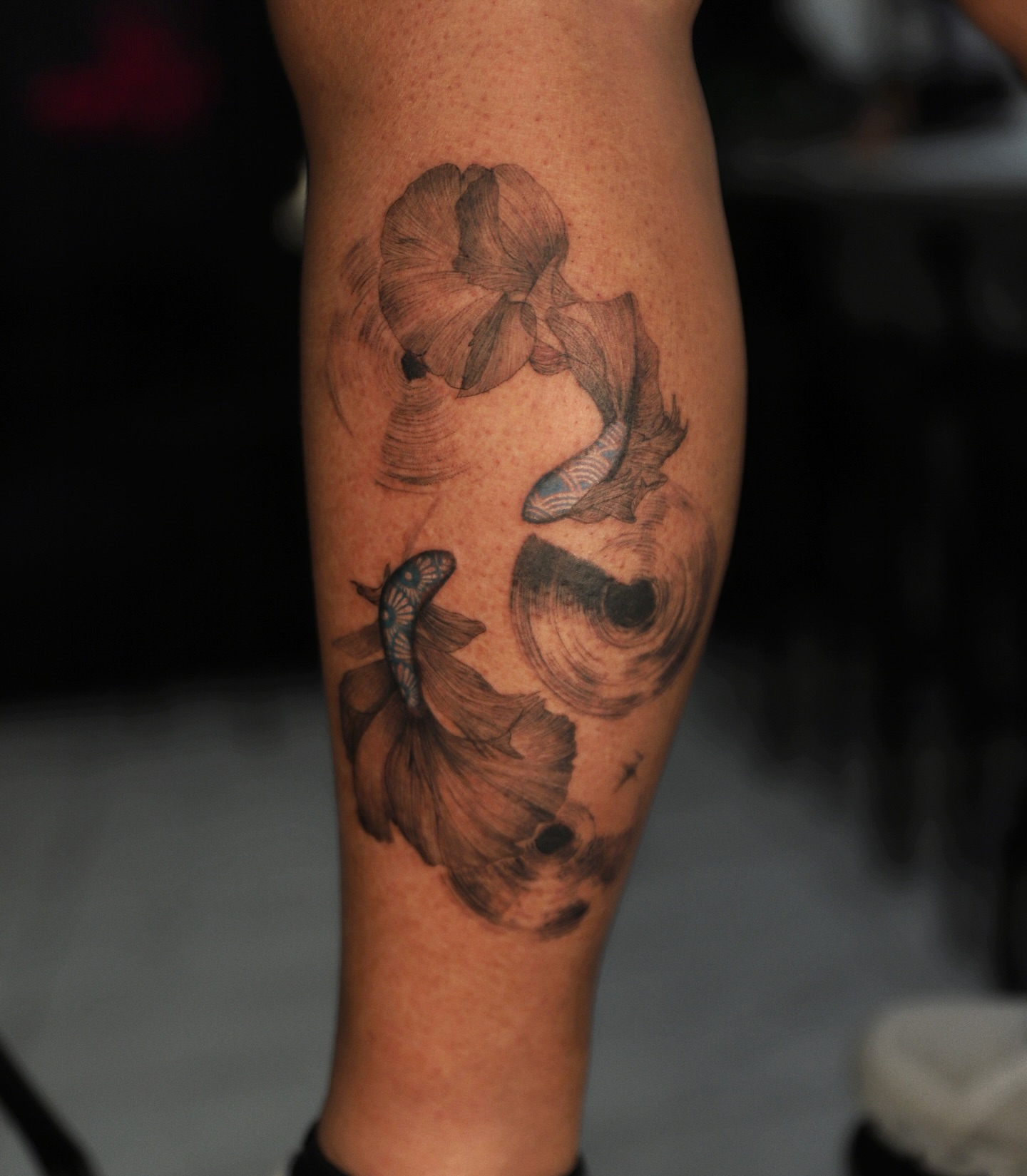 Abstract fish dotwork tattoo on the forearm by Las Vegas tattoo