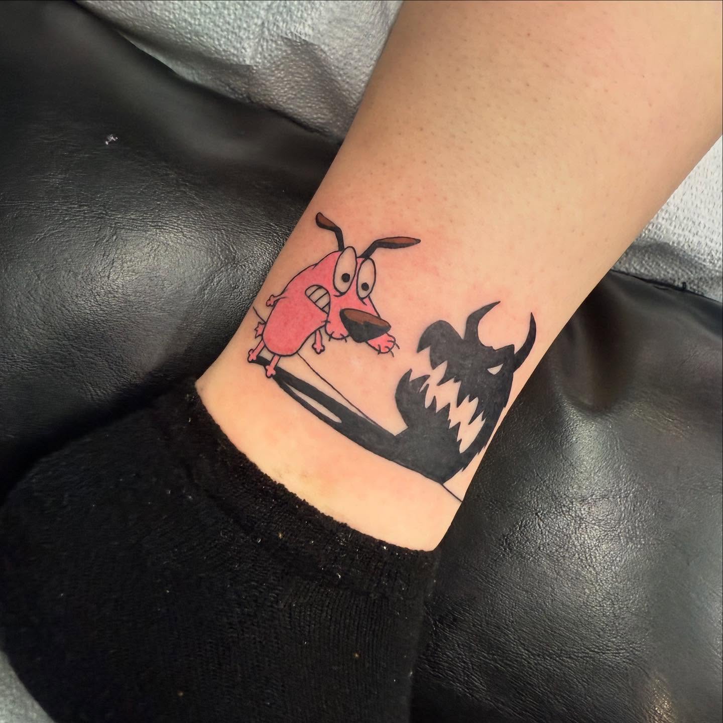 Dog and devil dotwork tattoo on the forearm by Felicity