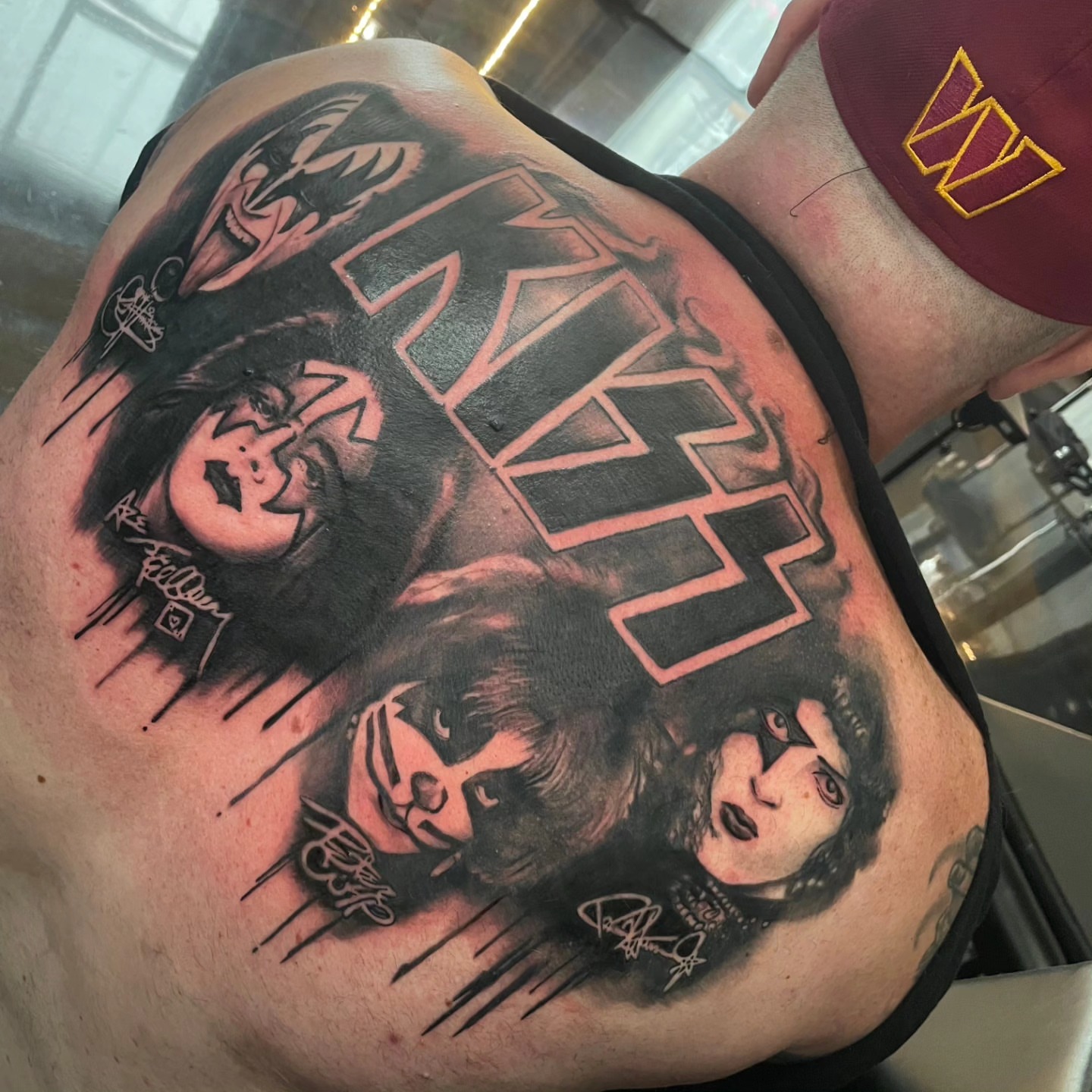 KISS band members realism tattoo on the chest by Tivis Phillips