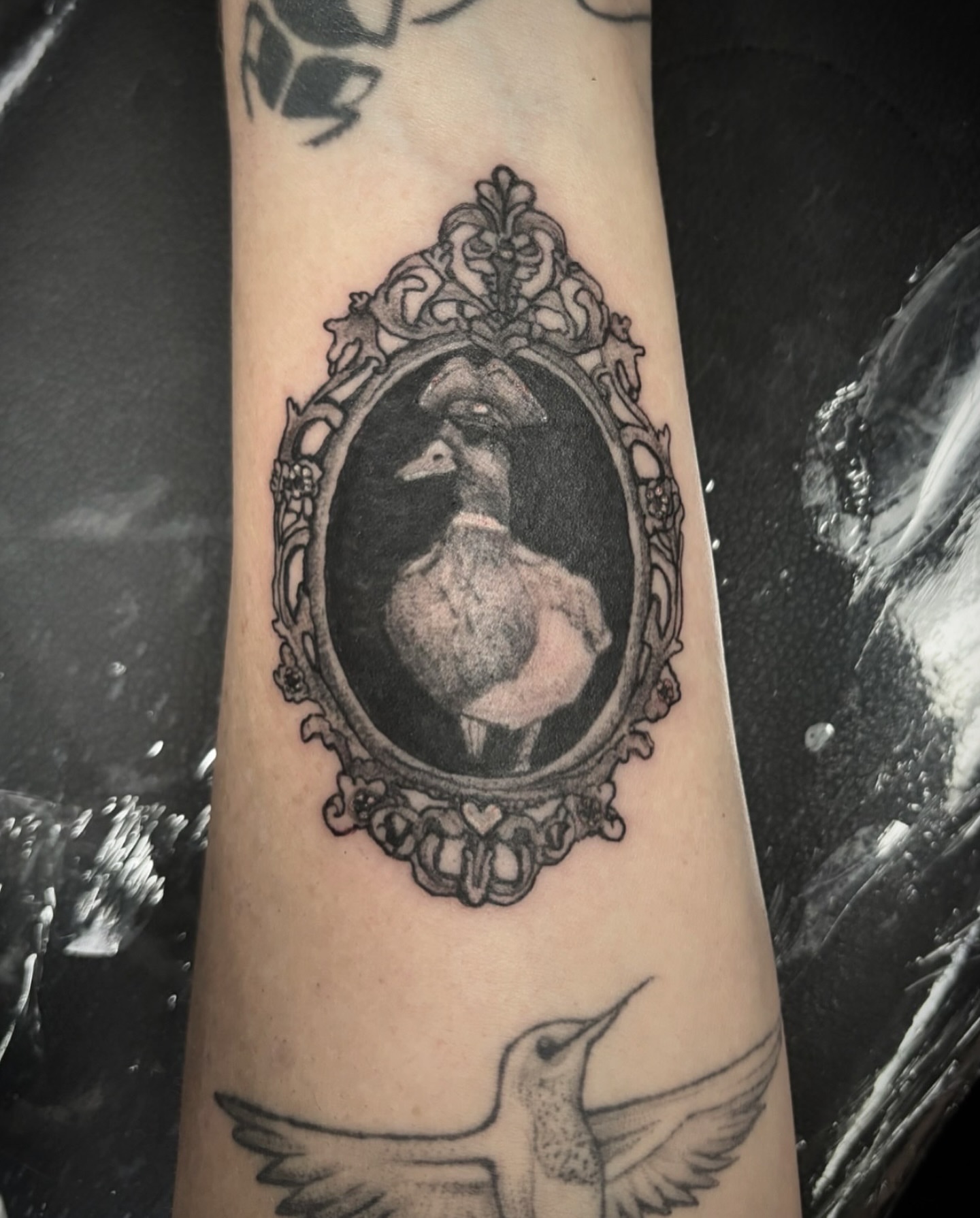 Duck in cameo black and grey tattoo on the forearm by Love 🥀 222