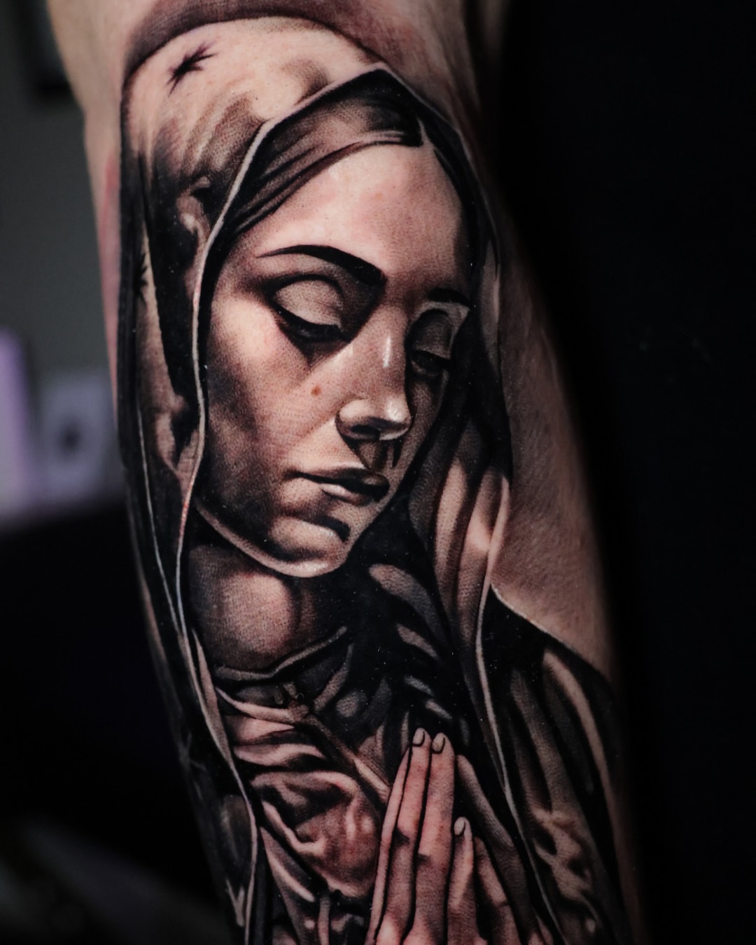 Praying woman realism tattoo on the forearm by Jesus Bravo