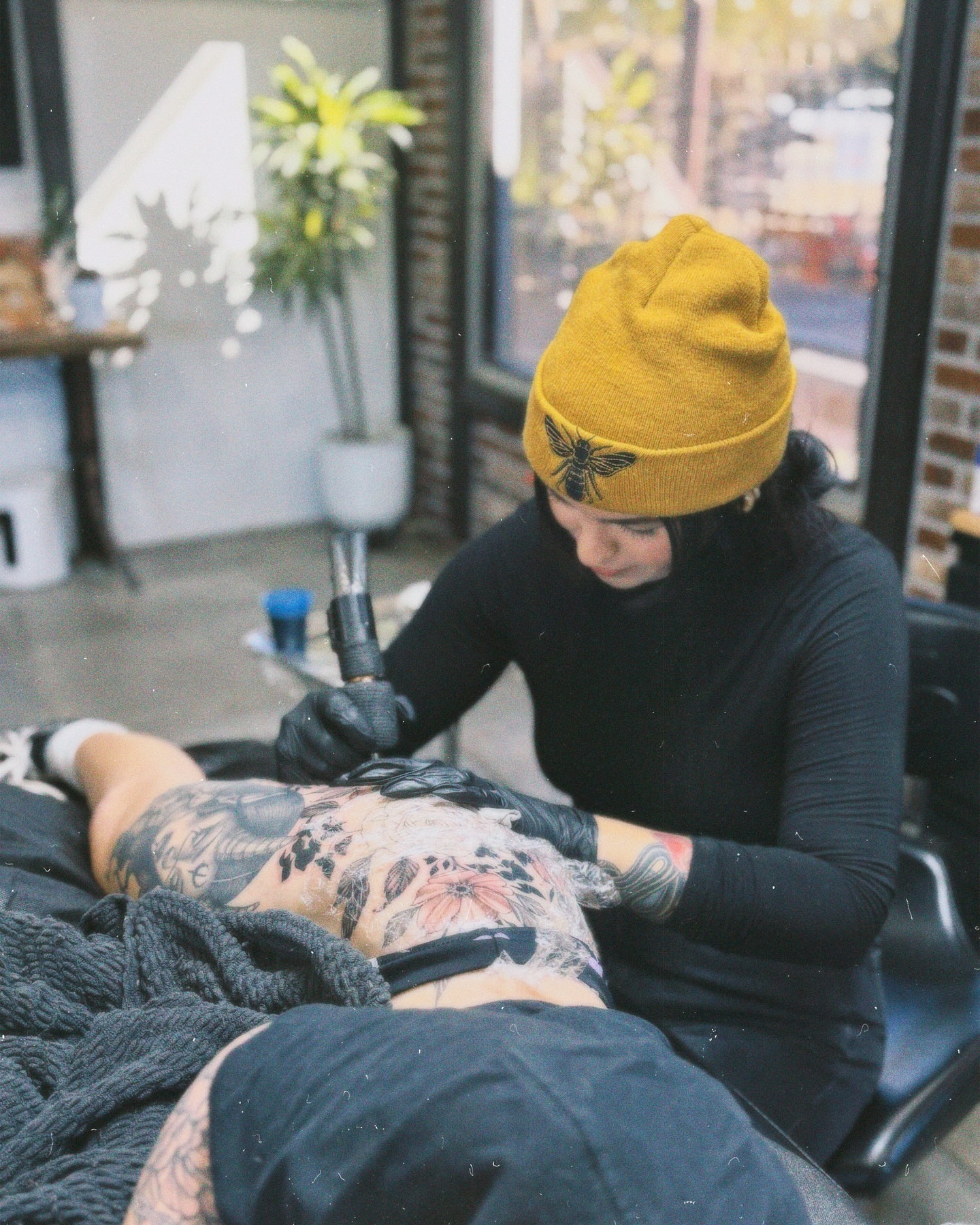 Floral design black and grey tattoo on the thigh by πππππ βππ£π£ππ€ππ , Tucson, Arizona