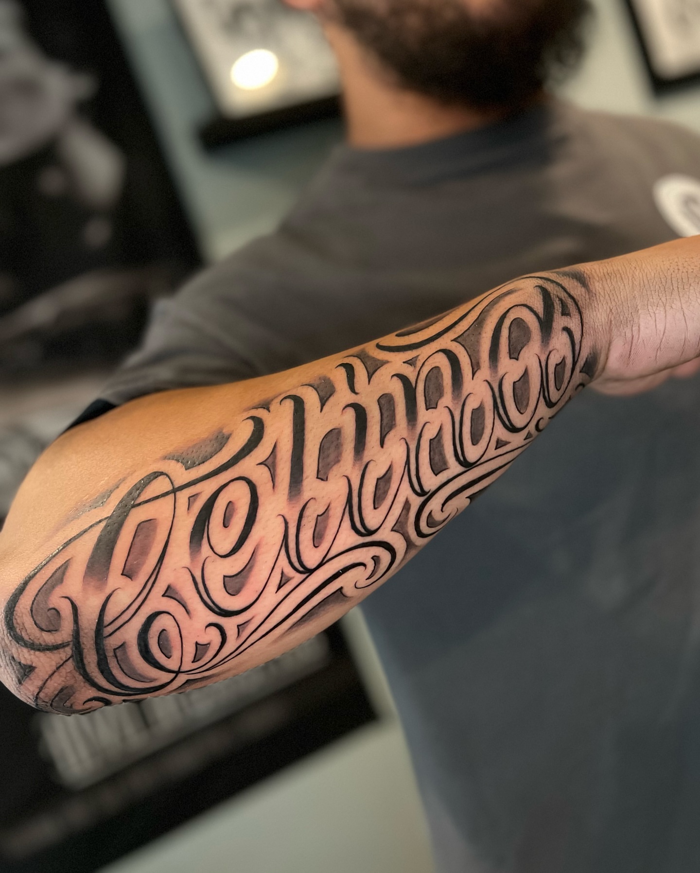 Script lettering lettering script tattoo on the forearm by Moose