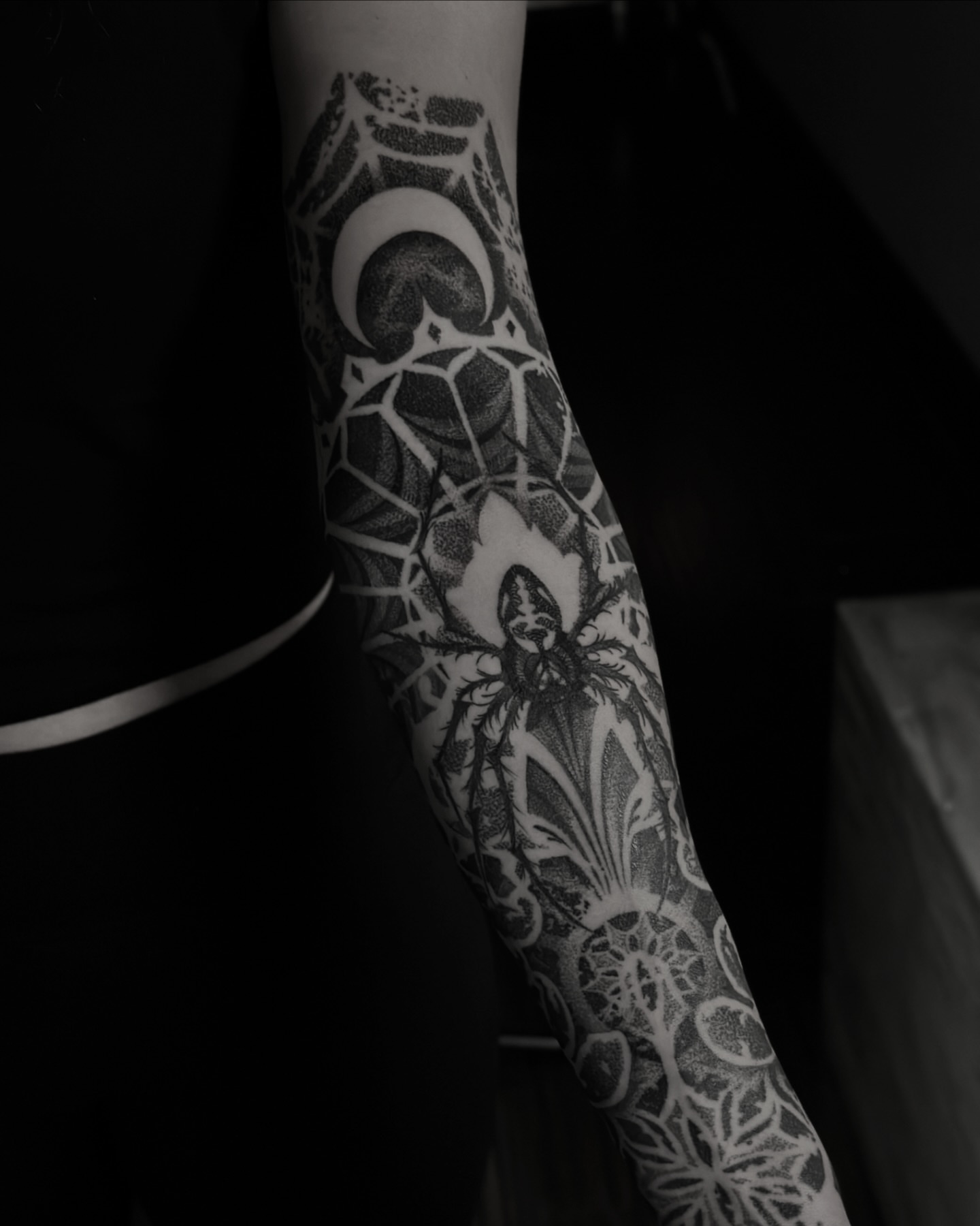 Abstract geometric design dotwork tattoo on the forearm by Nick Fierro