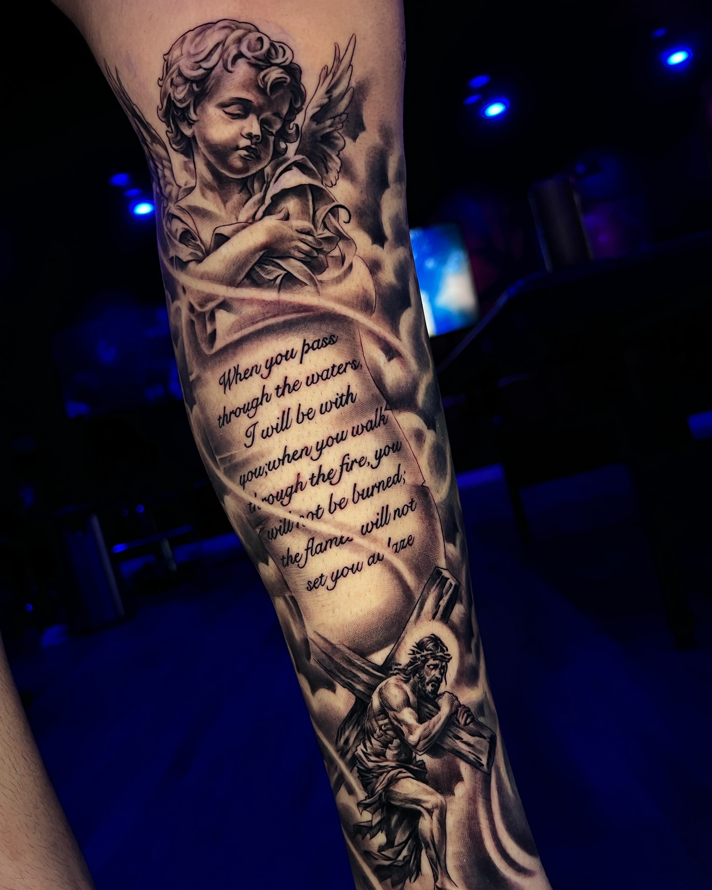 Angel and cross realism tattoo on the forearm by Raw Hound, Hialeah, Florida