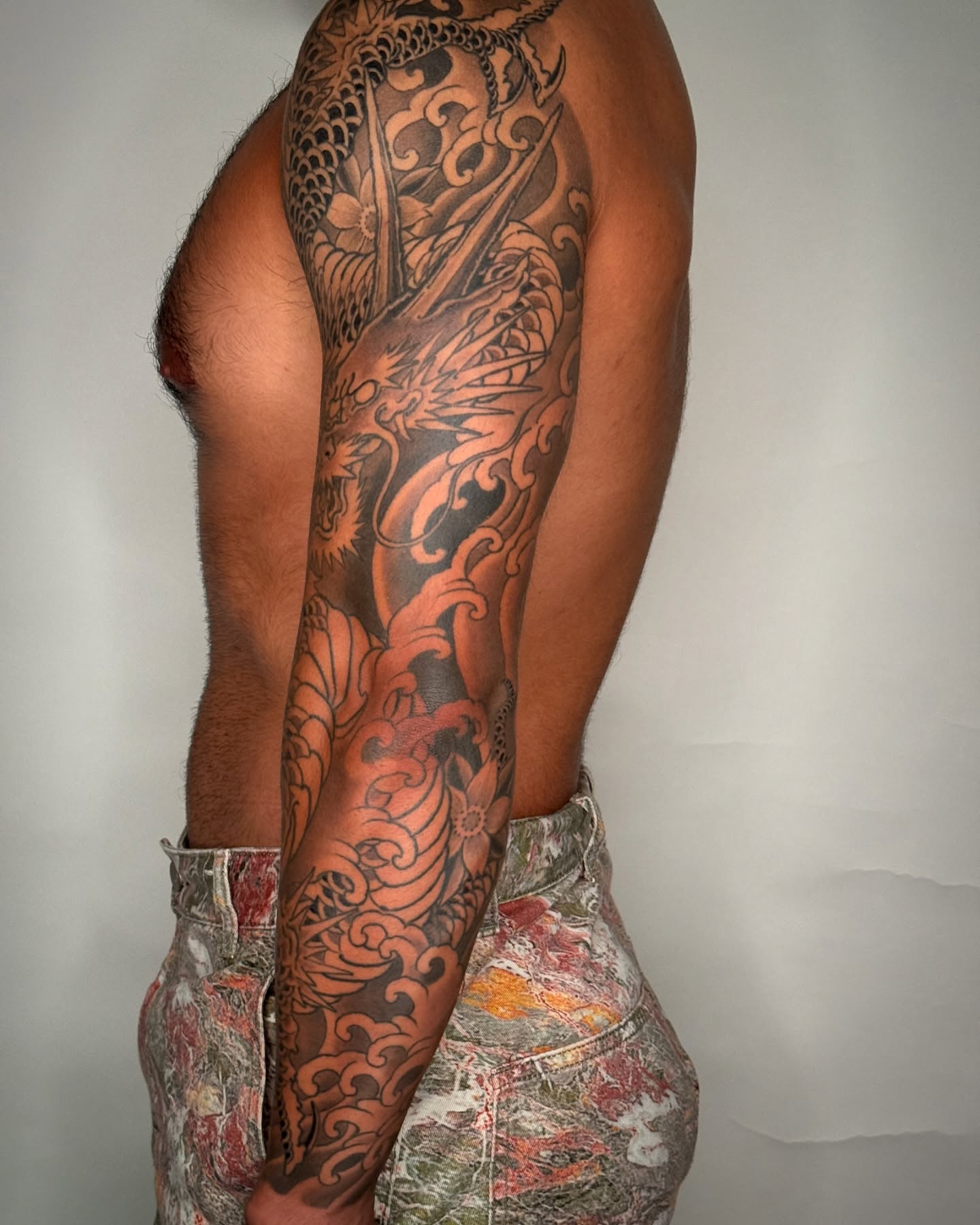 Dragon and waves japanese irezumi tattoo on the upper arm by Tattooer by Trade Wannabe Artist at Heart