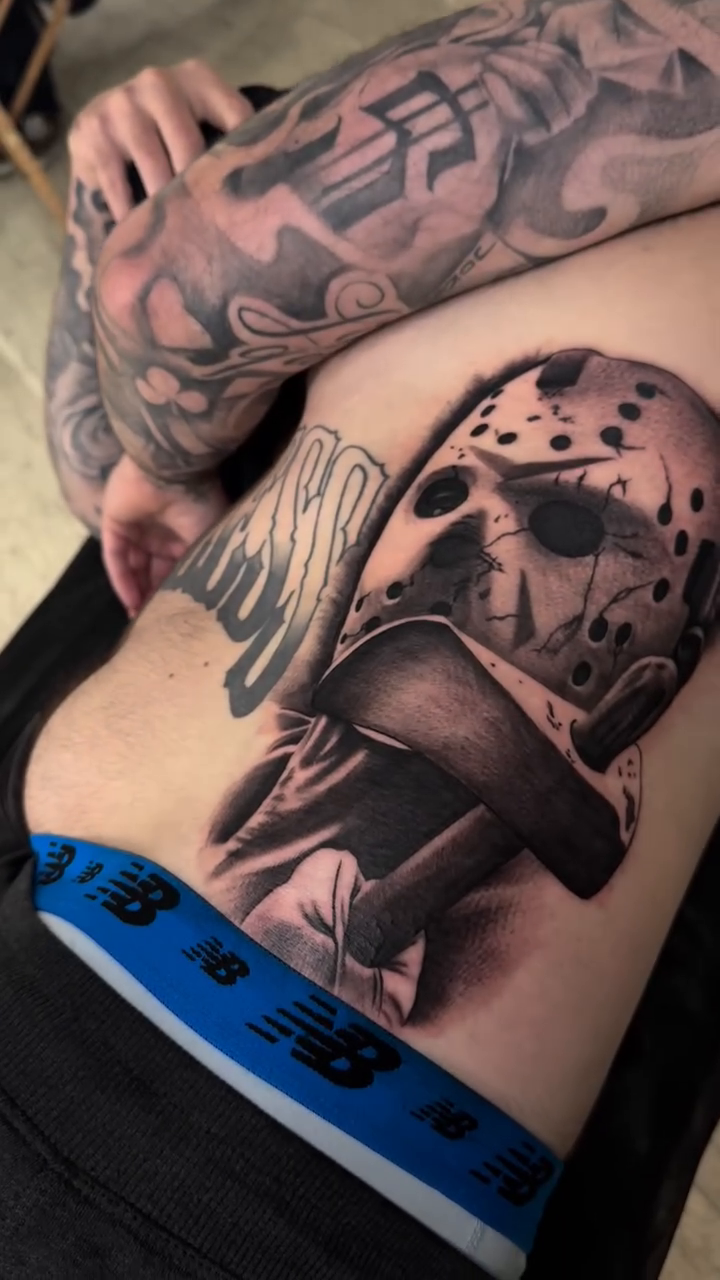 Jason Voorhees mask and axes realism tattoo by Jason Martinez