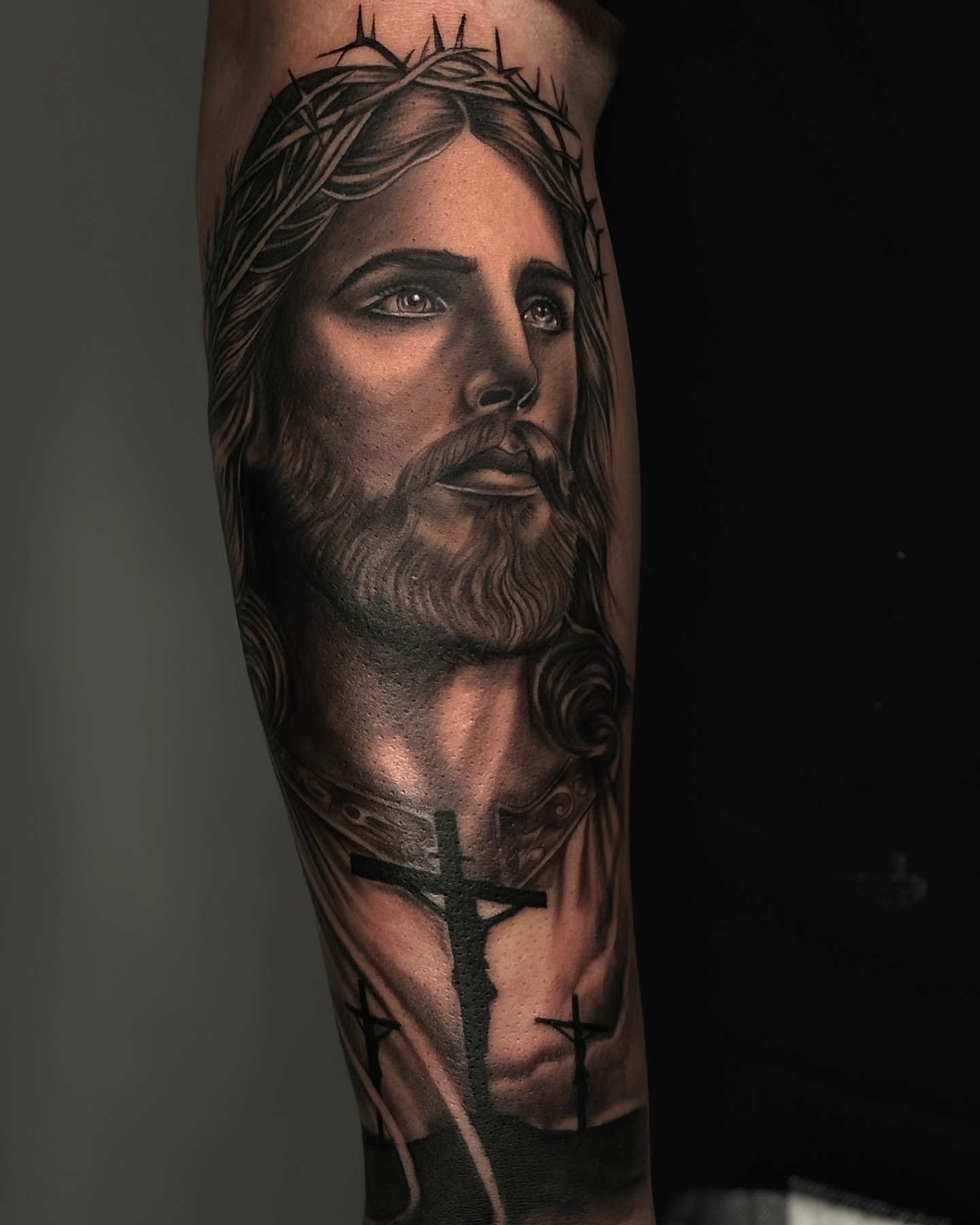 Religious figure realism tattoo on the forearm by Nj Tattoo Artist Inkdyou, Bloomfield, New Jersey