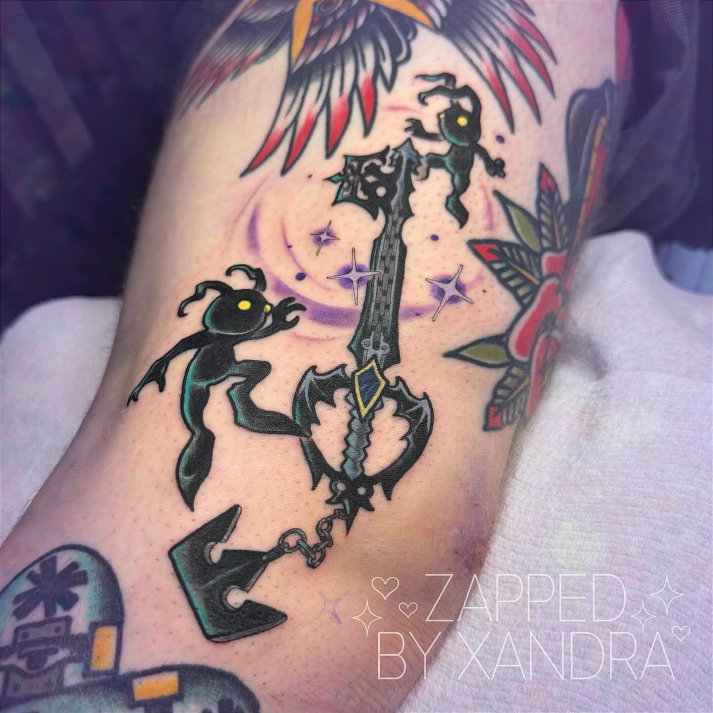 Keyblade and Demons American traditional tattoo on the forearm by ๐๐ข๐ฏ๐ฅ๐ณ๐ข
