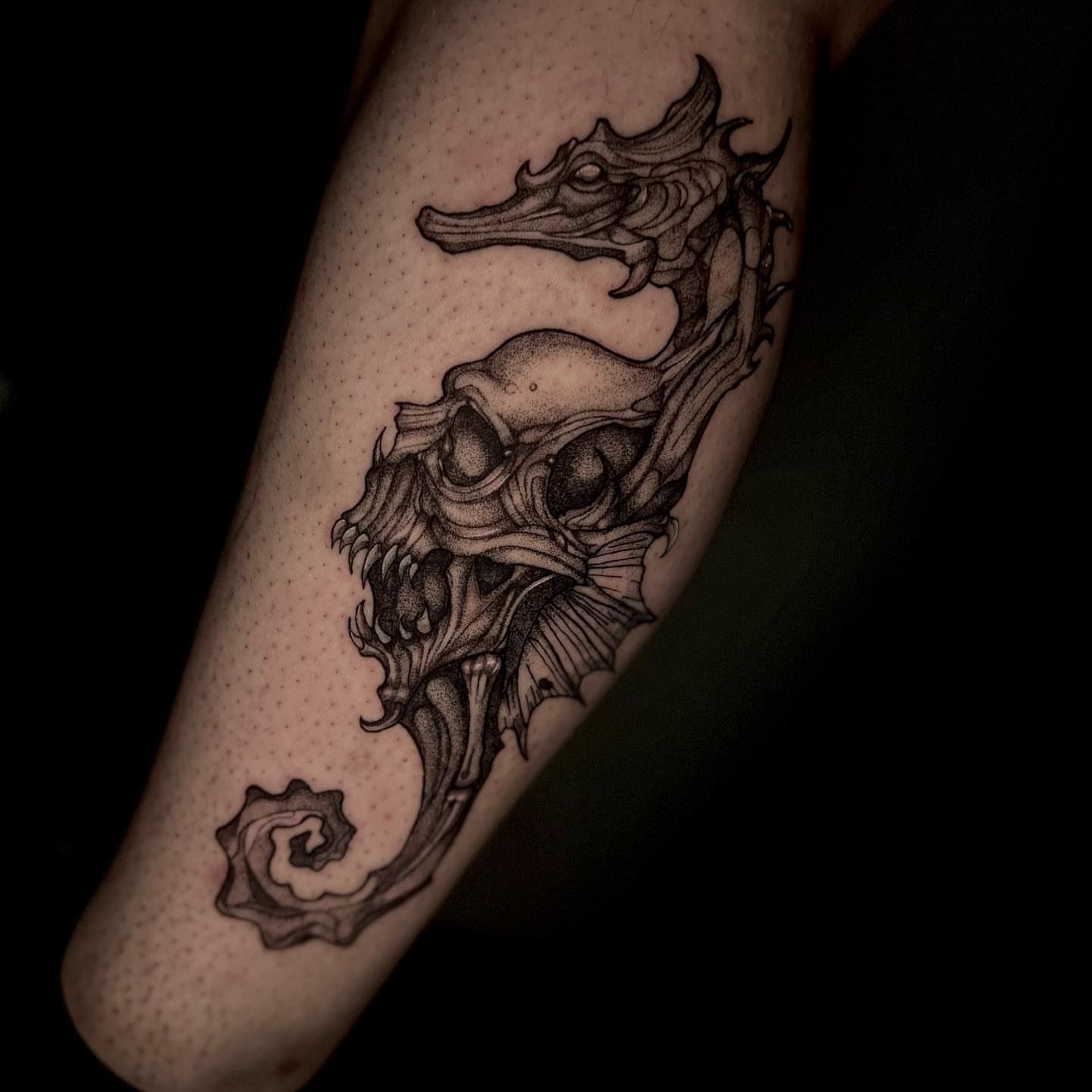 Seahorse dotwork tattoo on the forearm by V