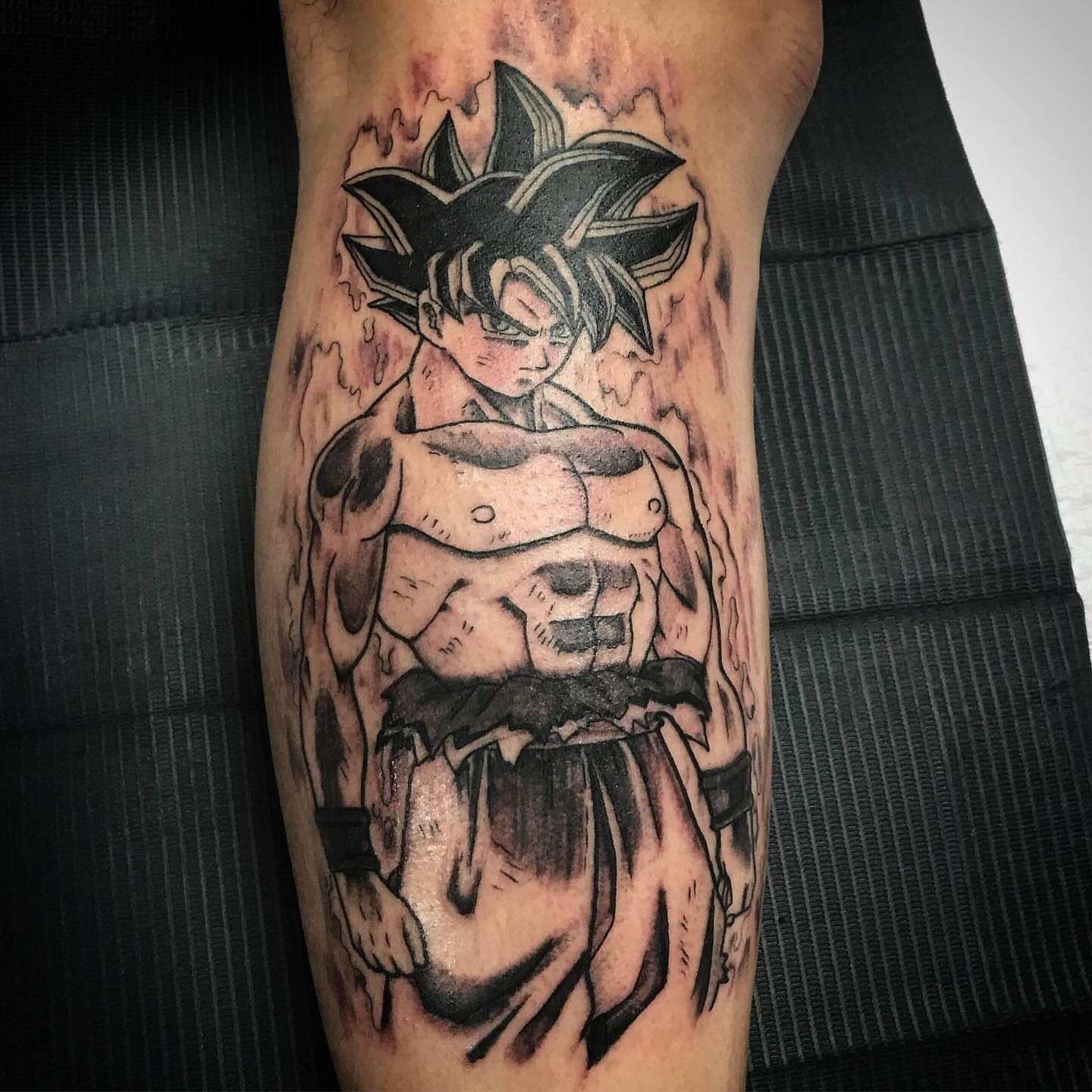 Son goku anime tattoo on the forearm by Tonii Florrez