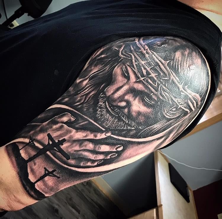 Jesus Christ realism tattoo on the forearm by Tonii Florrez