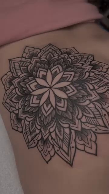 Mandala geometric tattoo on the thigh by Lisa Nikolopoulos, New York, New York