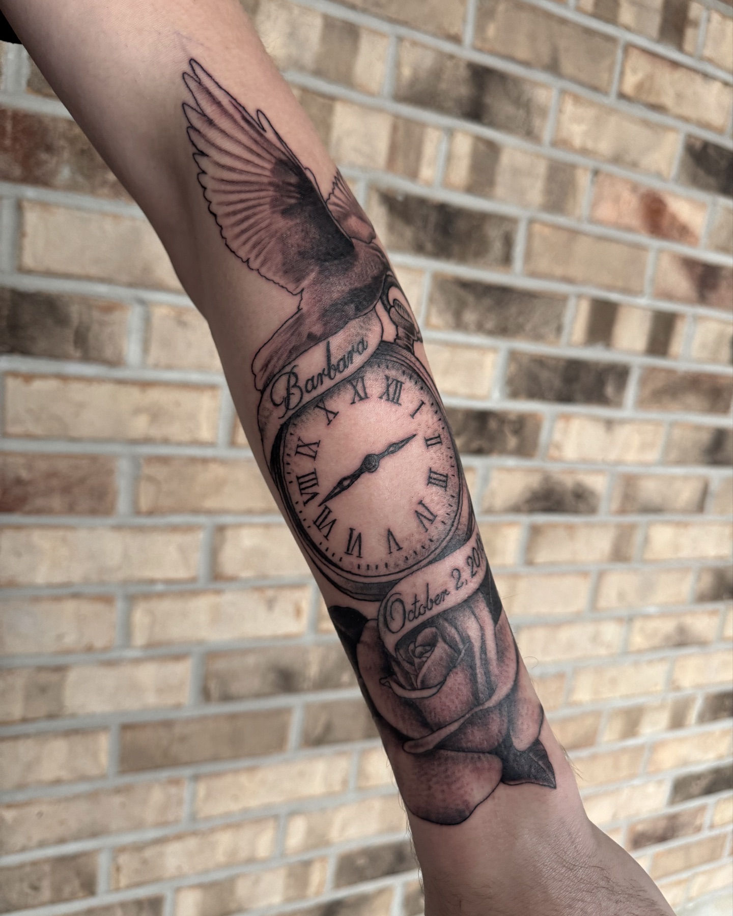 Clock and bird realism tattoo on the forearm by Storm