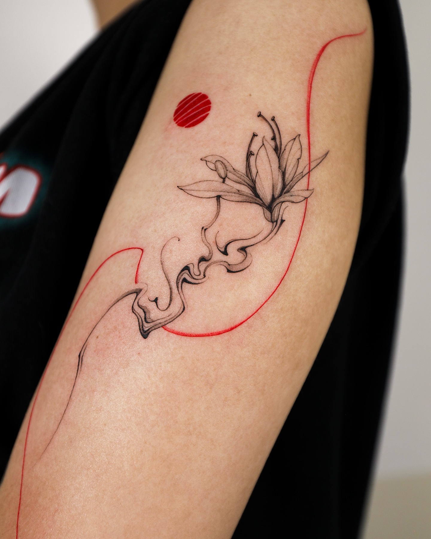 Flower and abstract swirl fine line tattoo on the forearm by ๐๐๐ฆ ๐๐ ๐ฎ๐ฒ๐๐ง