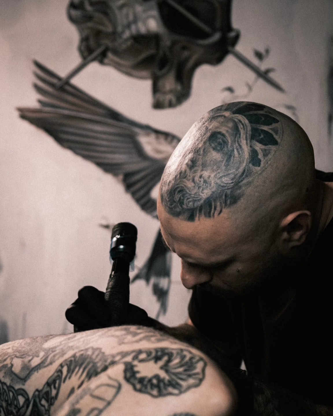 Bird black and grey tattoo on the head by mr.scriptkeeper