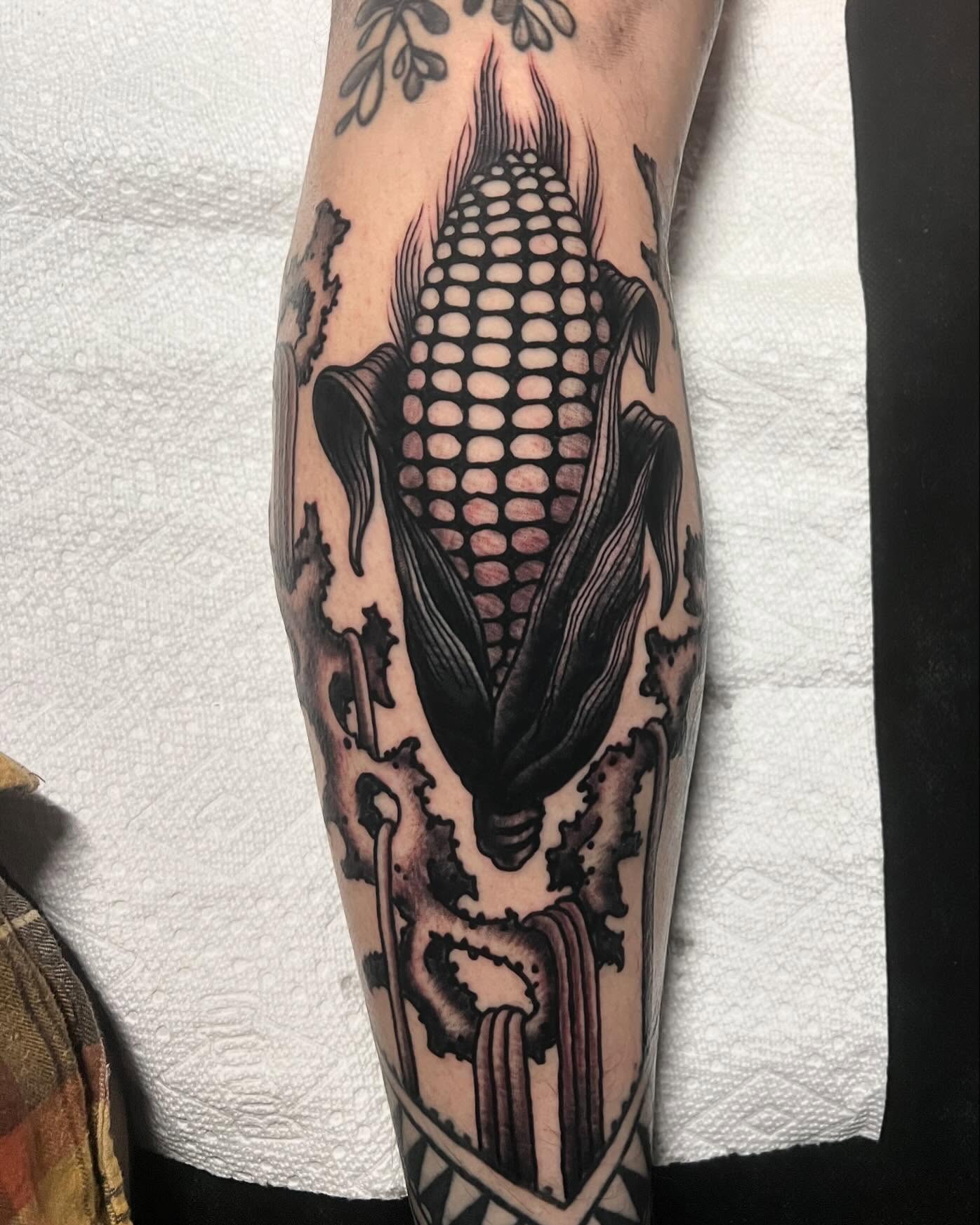 Corn cob black and grey tattoo on the forearm by Matt E.