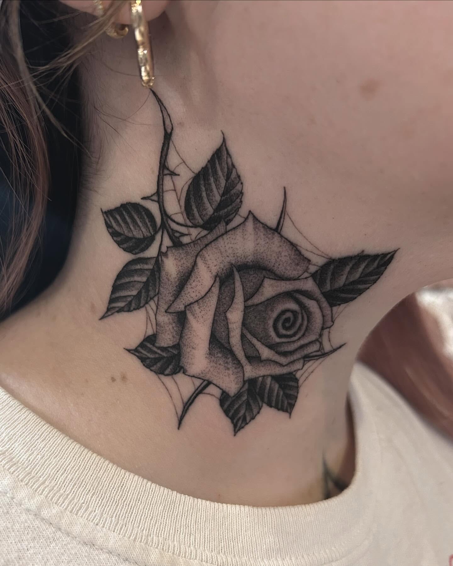 Rose dotwork tattoo on the neck by Jake Hodson, Nashville, Tennessee