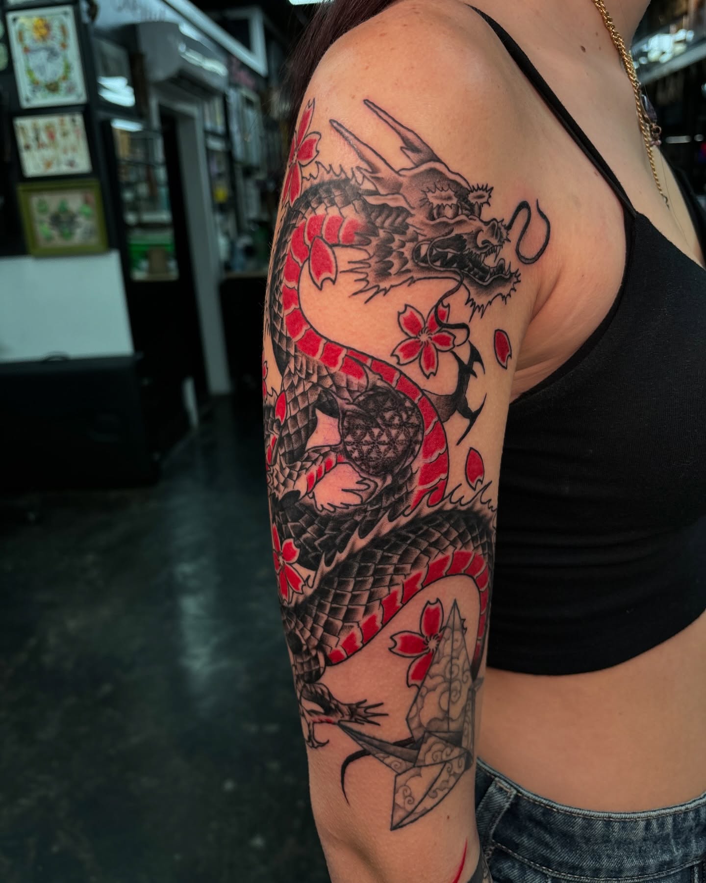 Dragon and cherry blossoms japanese irezumi tattoo on the upper arm by @seibastattoos, Virginia Beach, Virginia