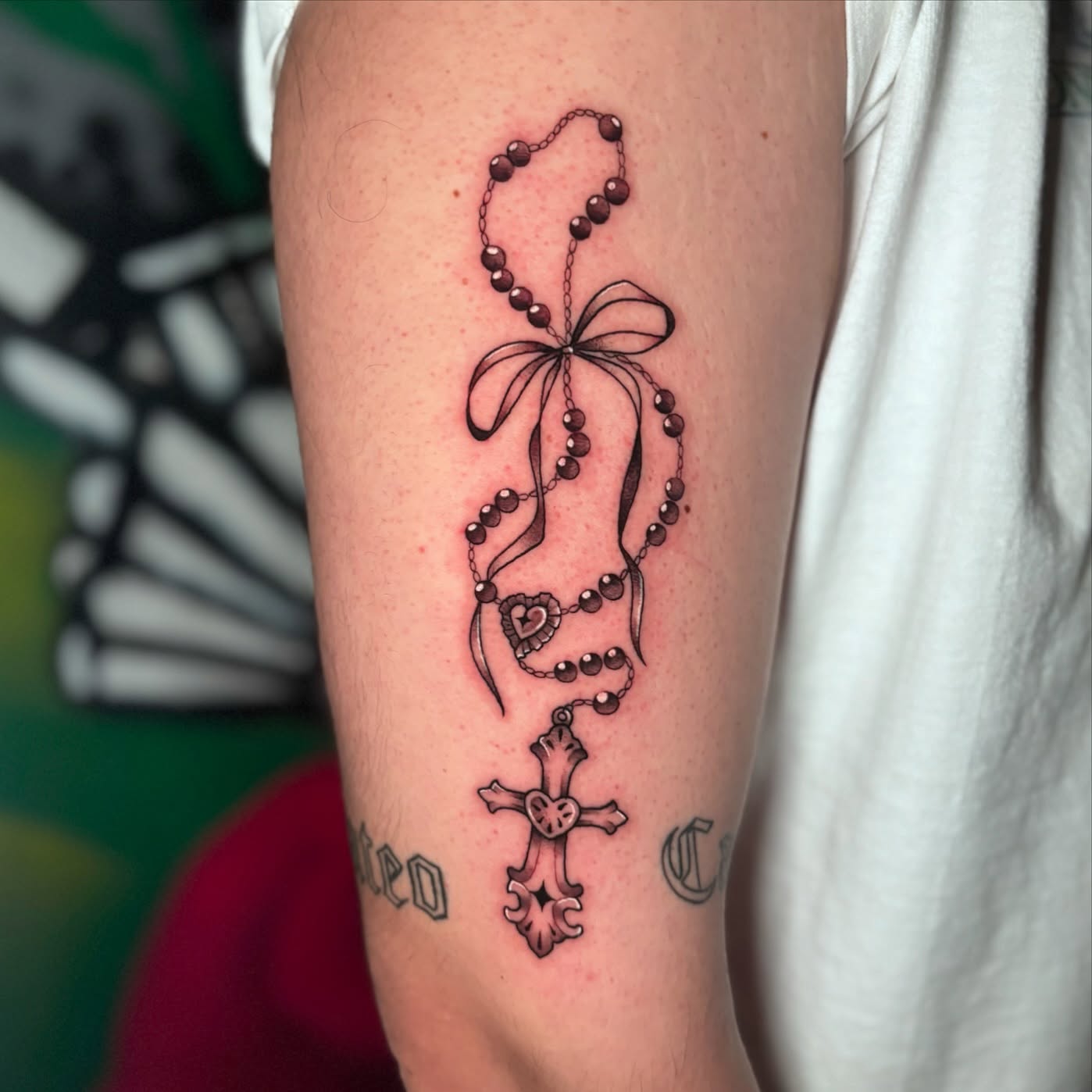 Rosary and cross black and grey tattoo on the forearm by 𝕊𝕒𝕞 ☪︎ ִ ࣪𖤐 𐦍 ☾𖤓