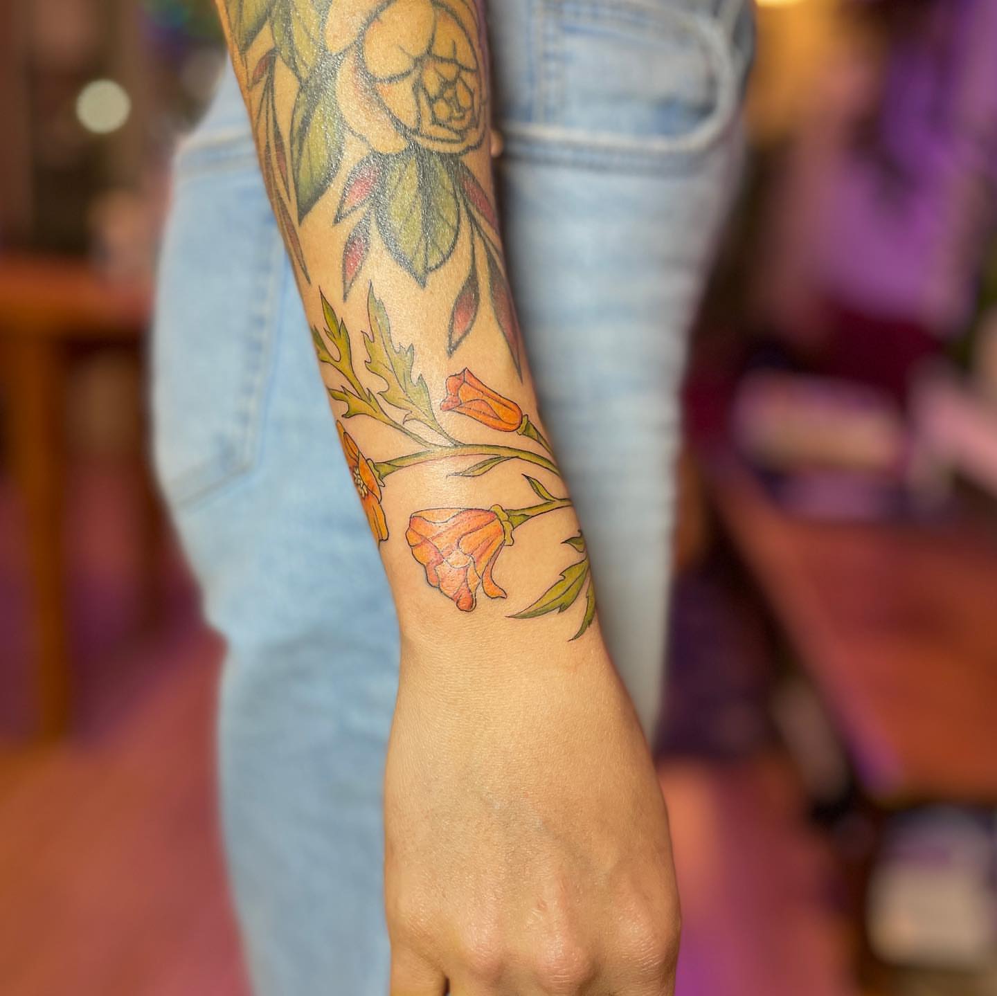 Flowers dotwork tattoo on the forearm by Reba Slate