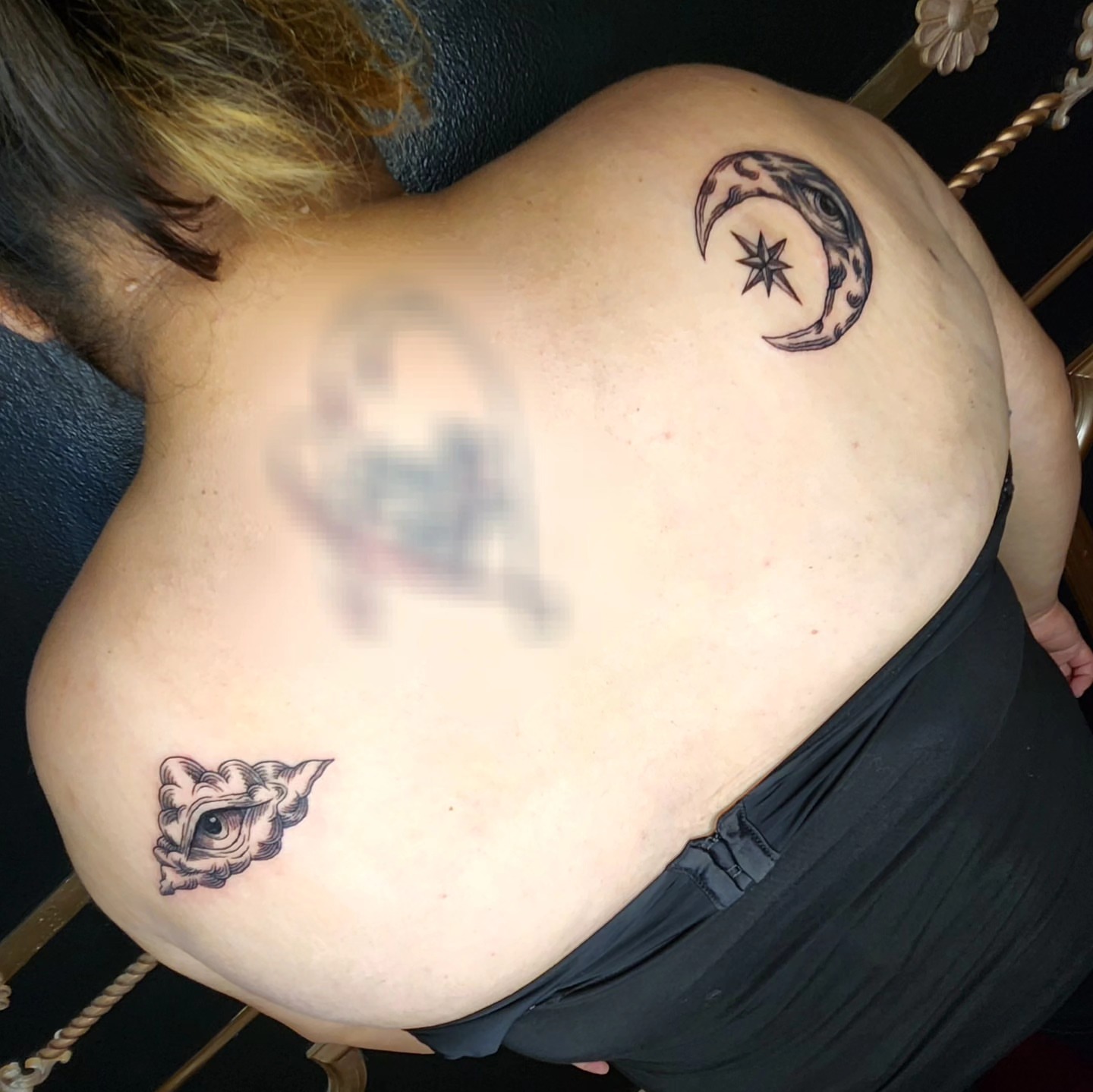 Moon and star black and grey tattoo on the back by Perry