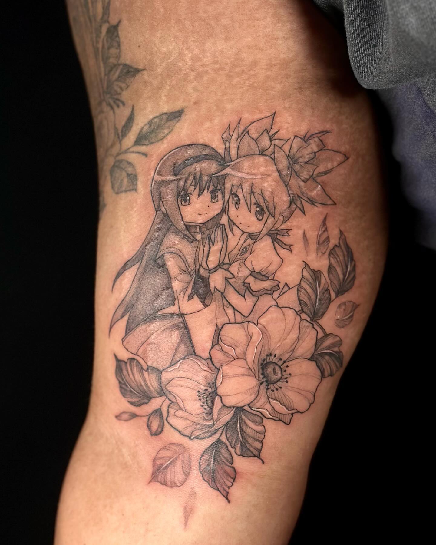Anime characters with flowers anime tattoo on the forearm by Sabrina, Harrison, New Jersey
