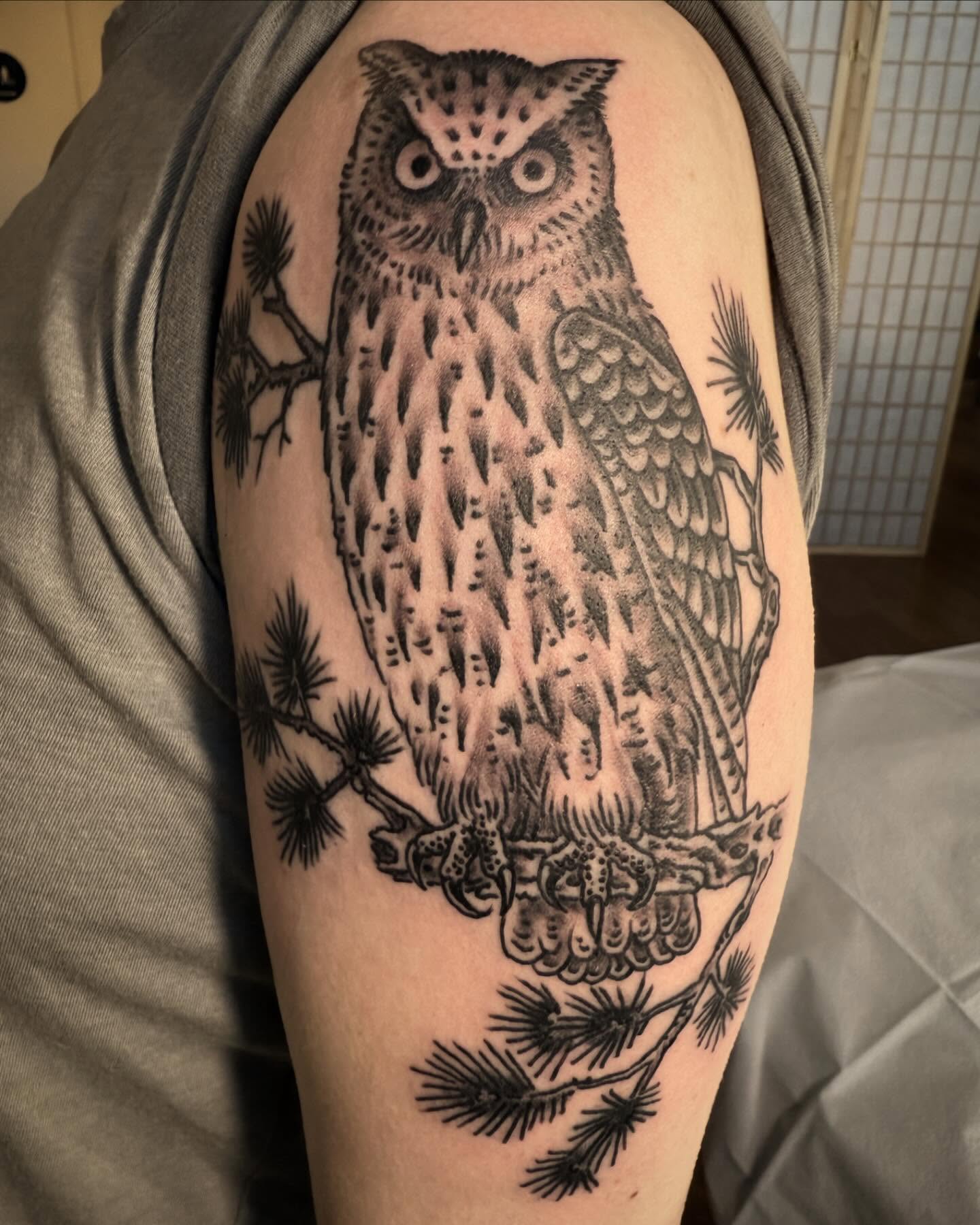 Owl black and grey tattoo on the forearm by Jesse Swanson, Santa Rosa, California