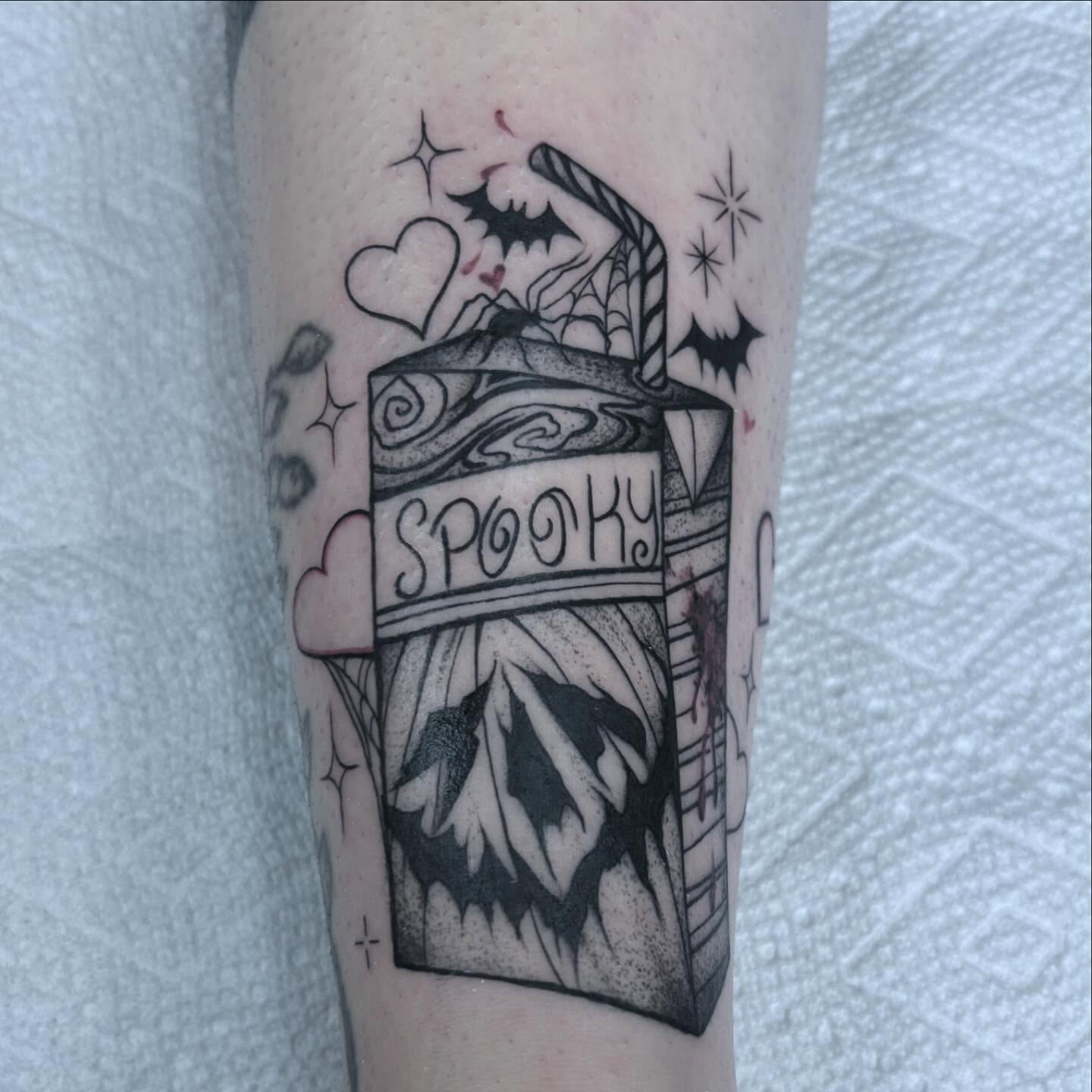 Spooky box black and grey tattoo on the forearm by Ivanna