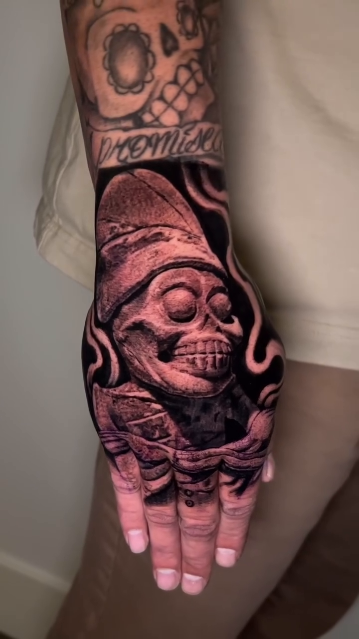 Skull with hat dark realism tattoo by Richie Moreno lll