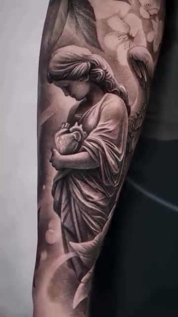 Angel holding a baby realism tattoo by Francis nieves, Miami, Florida