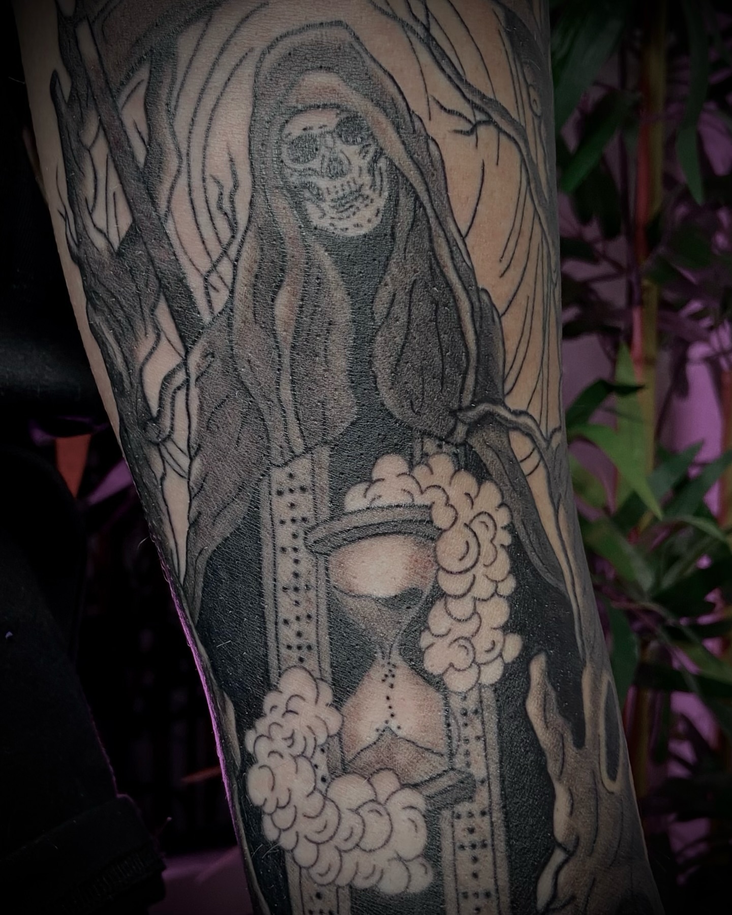 Reaper and cloud black and grey tattoo on the forearm by Shelbie, Salt Lake City, Utah